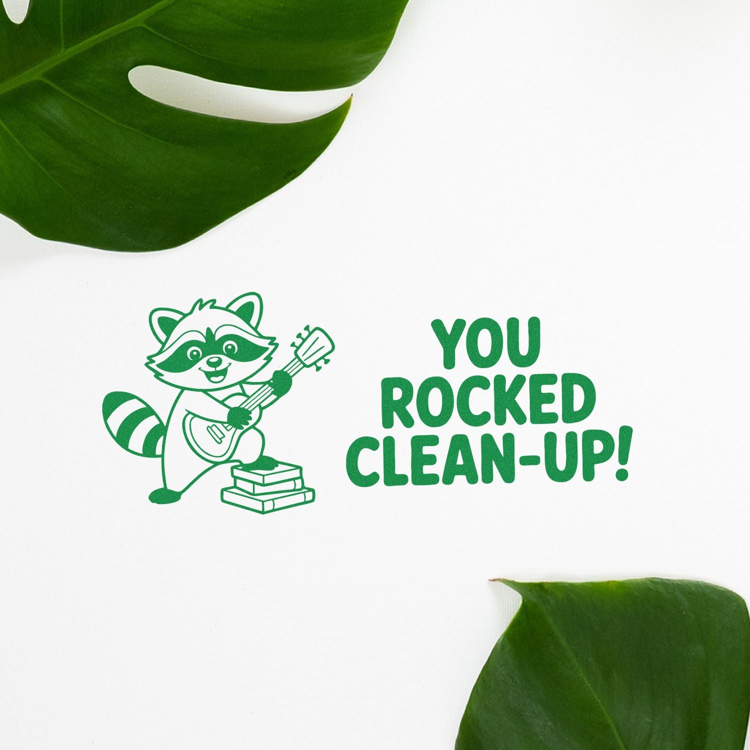 Custom rubber stamp design with raccoon guitarist and You Rocked Clean-Up! text for cleanup reward cards.