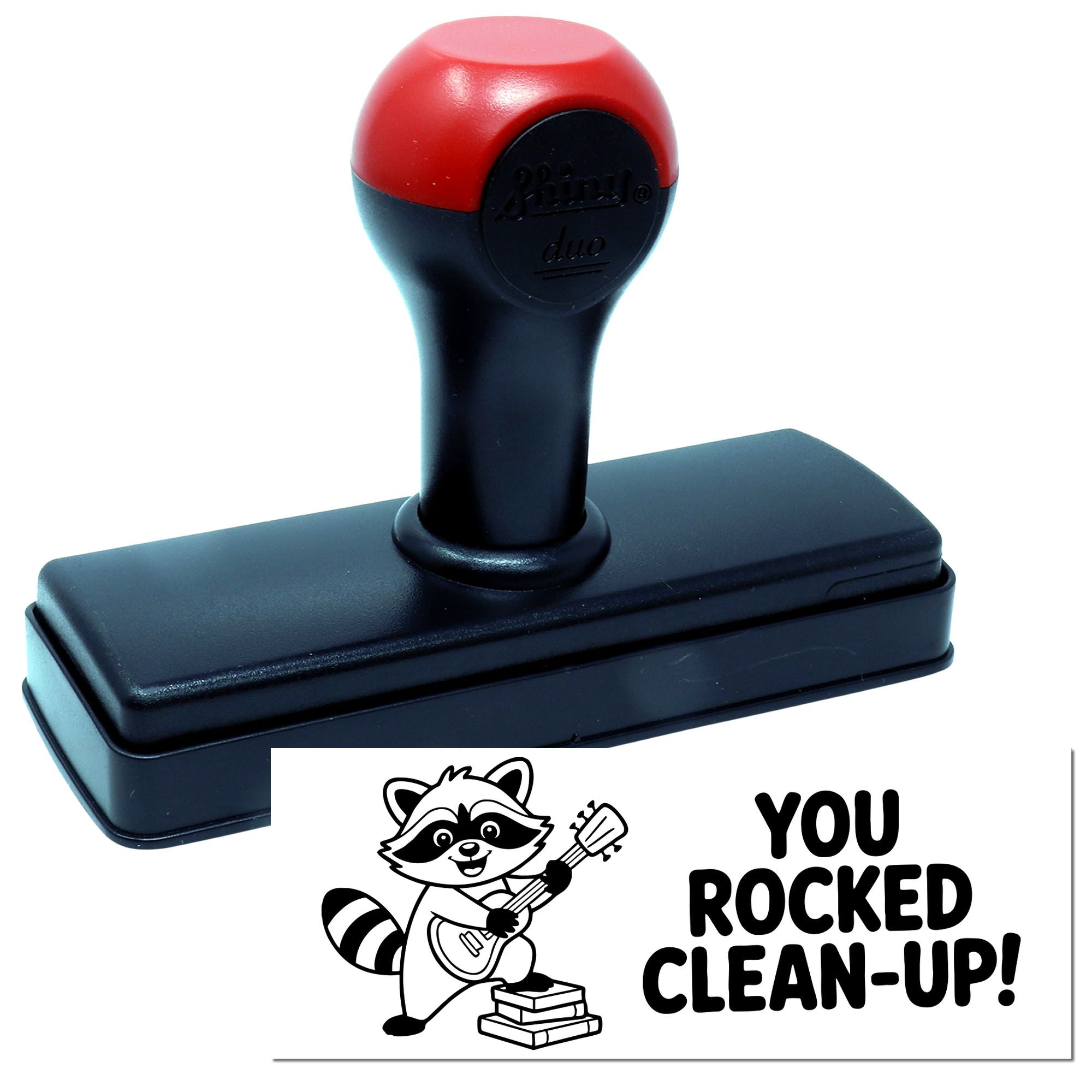 Self-inking rubber stamp with raccoon musician design and You Rocked Clean-Up! message for custom award stamping.