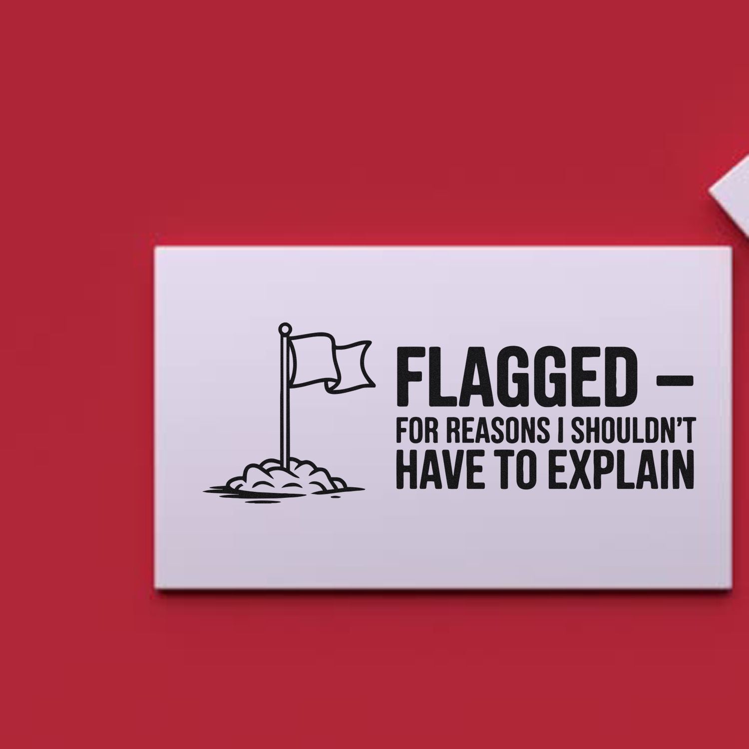 Humorous rubber stamp design reading Flagged for reasons I shouldnt have to explain with a flag icon.