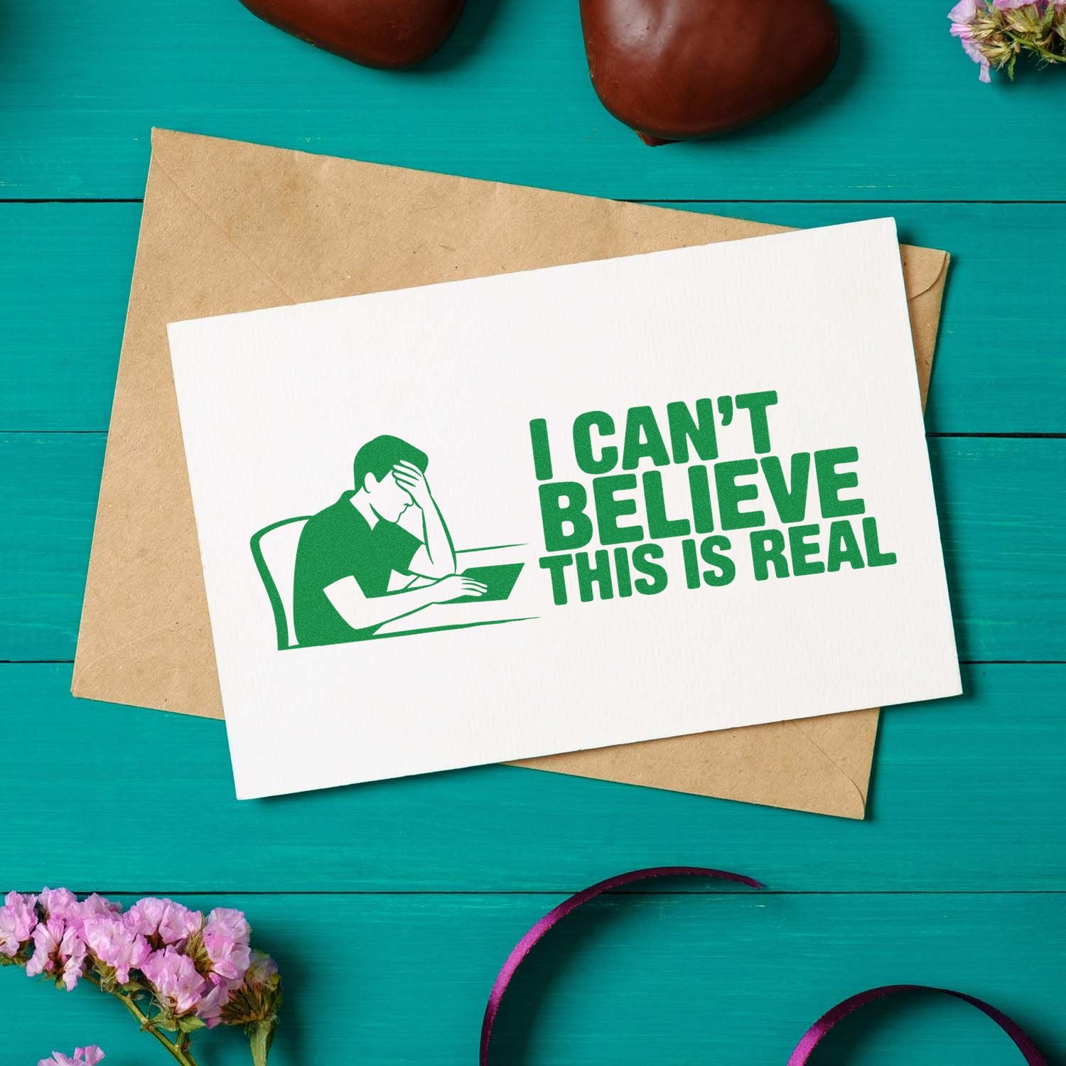 Green rubber stamp design with facepalm figure and I Cant Believe This Is Real sentiment on a greeting card.