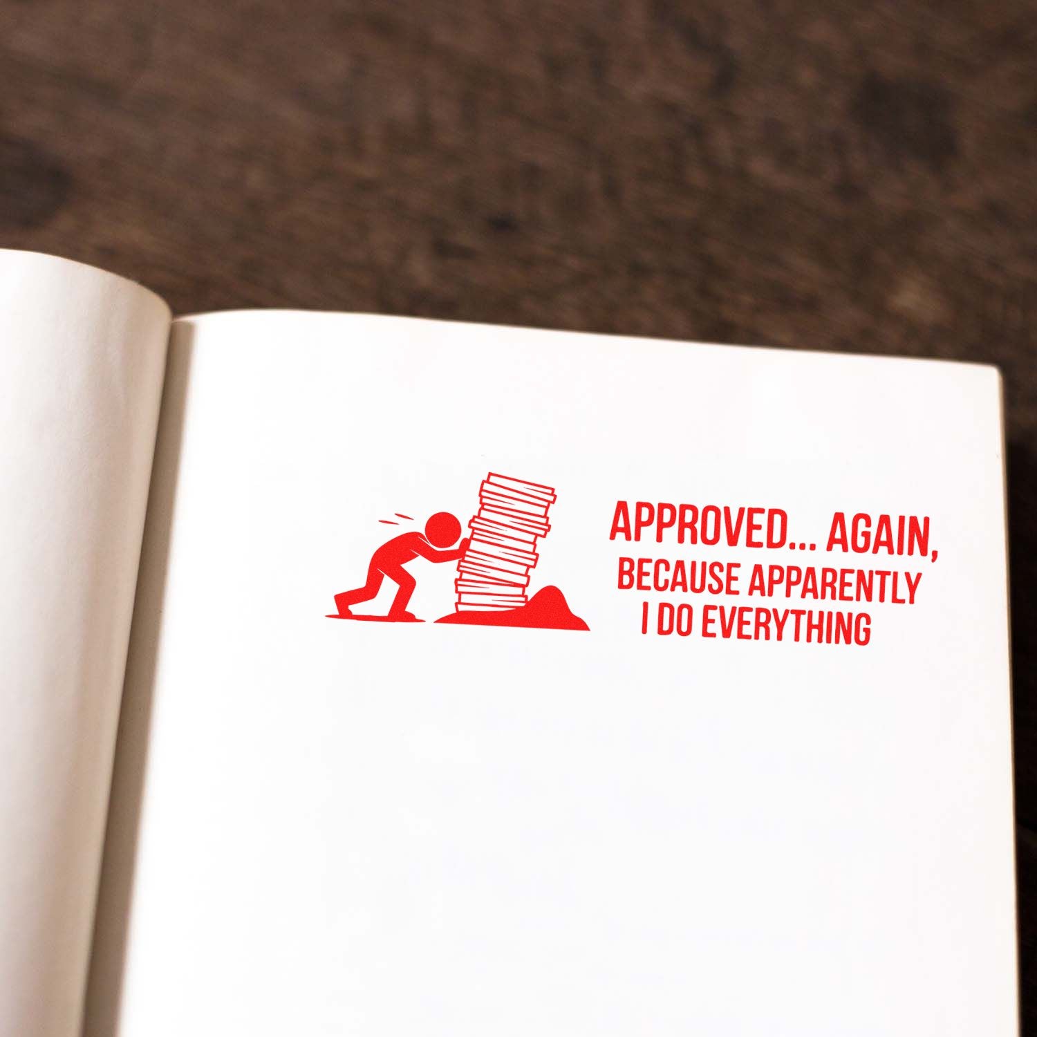 Humorous red rubber stamp impression reading Approved... Again on a notebook page, ideal for office and custom stamp branding.