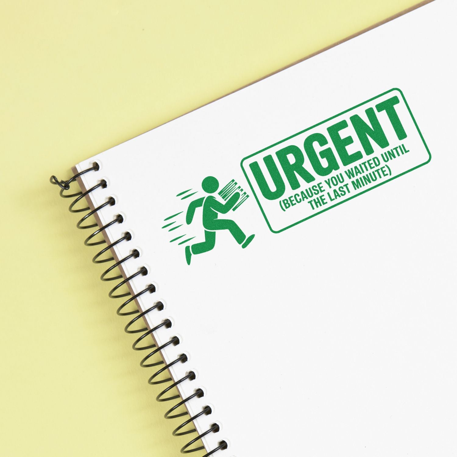 Green urgent rubber stamp on a notebook reads Urgent because you waited until the last minute with running figure.