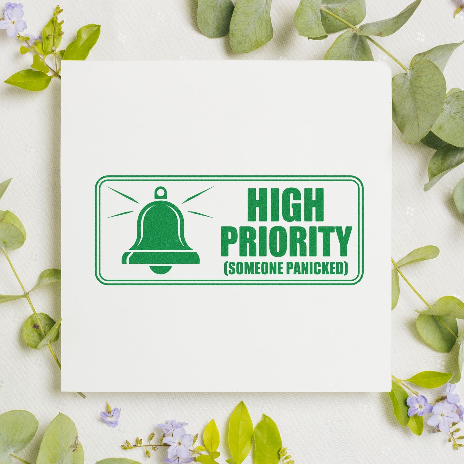 High Priority rubber stamp design with bell icon and humorous "Someone Panicked" office stamp text.
