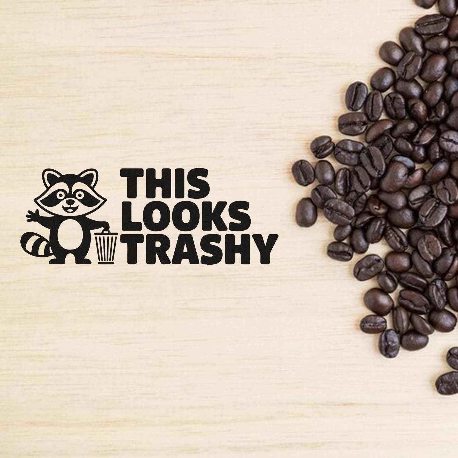 Funny raccoon rubber stamp with "This Looks Trashy" text, ideal for coffee lovers and trash-themed craft projects.