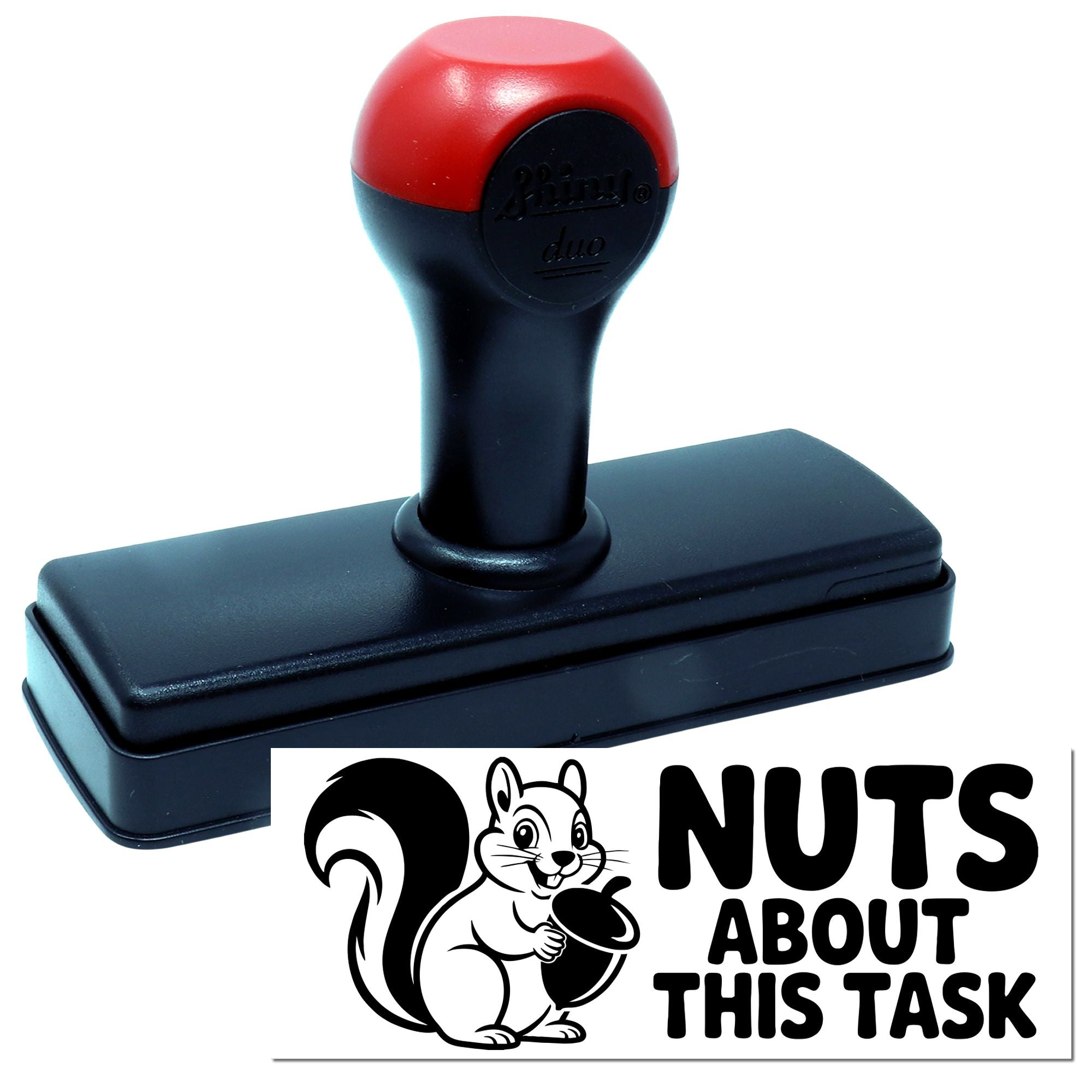 Self-inking squirrel rubber stamp with Nuts About This Task imprint for office, teacher, or reward use.