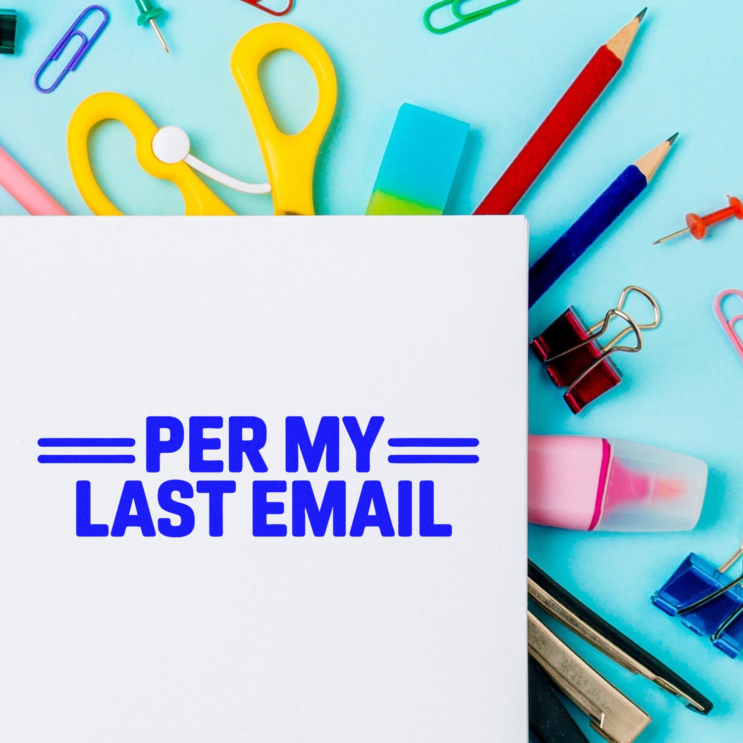 Per My Last Email rubber stamp on stationery, surrounded by colorful office supplies for sarcastic office communication.