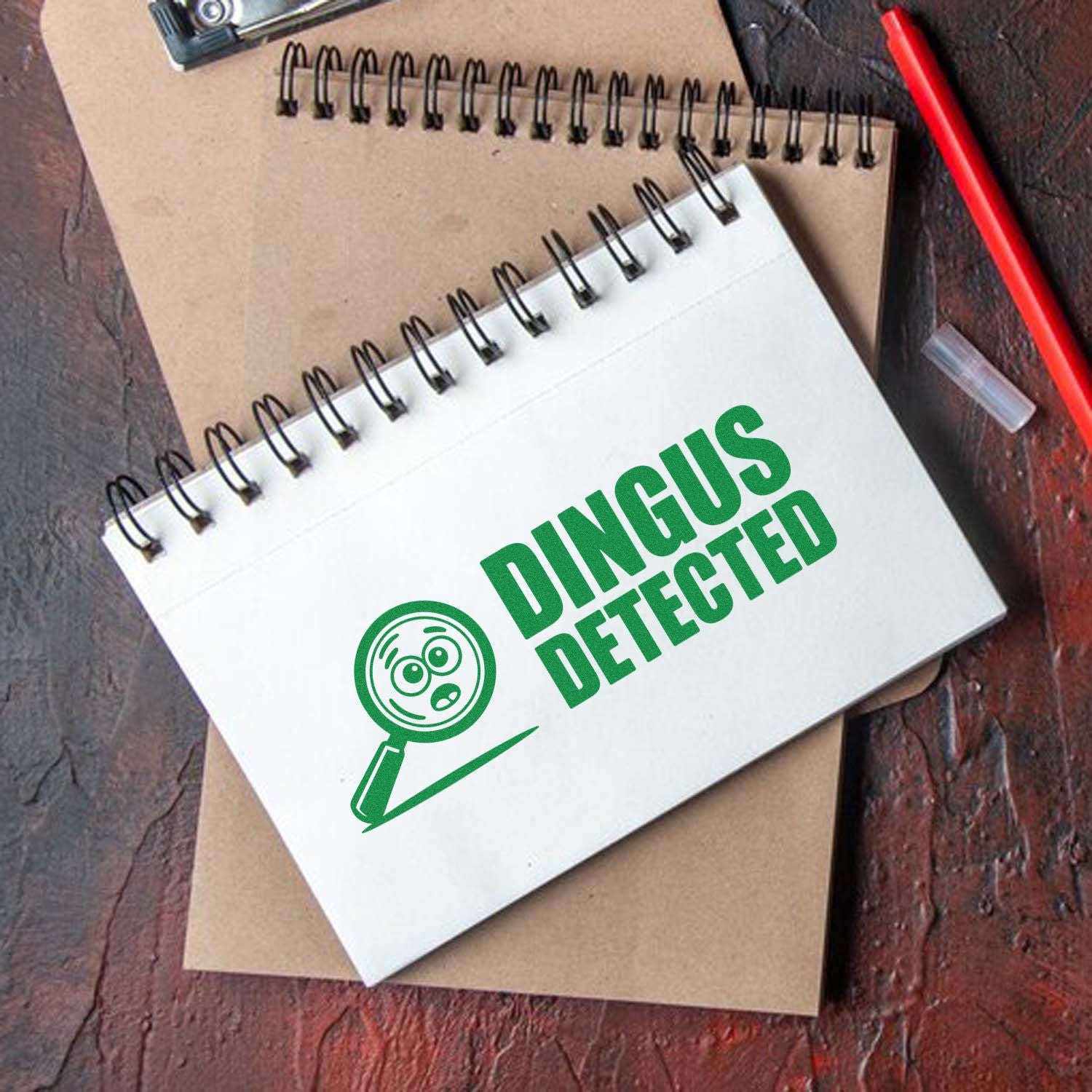 Custom rubber stamp reading Dingus Detected with detective icon for novelty school, office, or teacher stamping