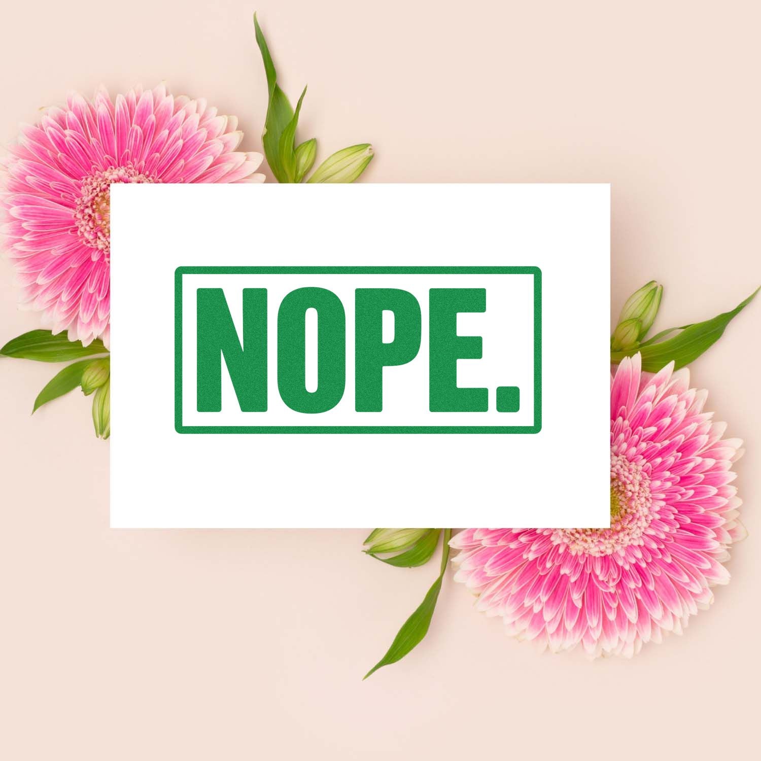 Green NOPE rubber stamp design with bold text and floral background for custom rejection or office use.