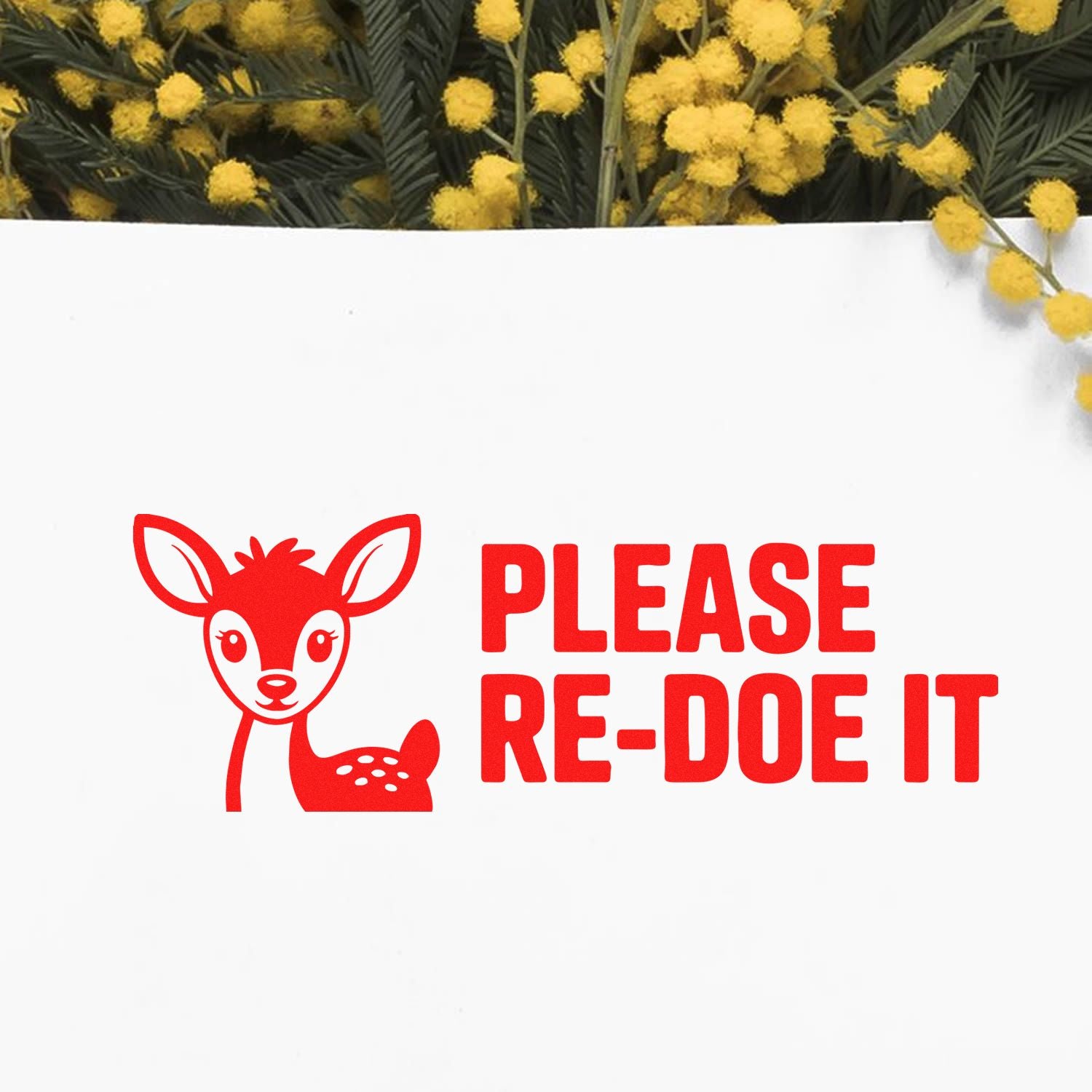 Custom rubber stamp with deer icon and Please Re-Do It message for document revision requests.
