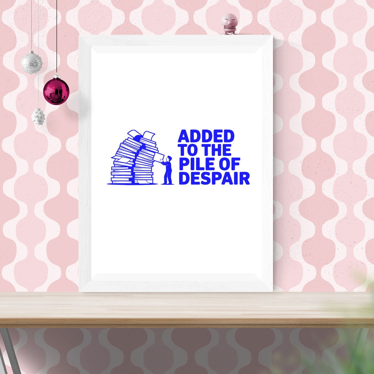 Book-themed rubber stamp design reading Added to the Pile of Despair with stacked books for humorous office or library use.