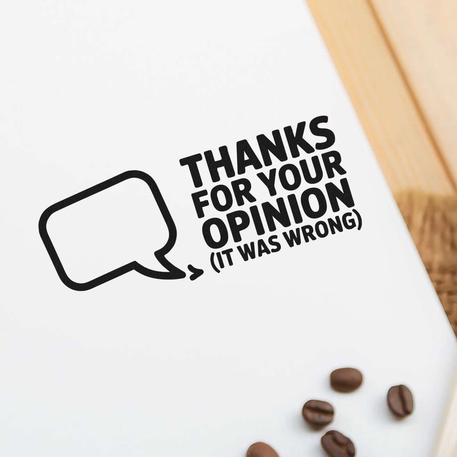 Humorous rubber stamp with speech bubble and bold text: Thanks for your opinion (it was wrong) for office use.