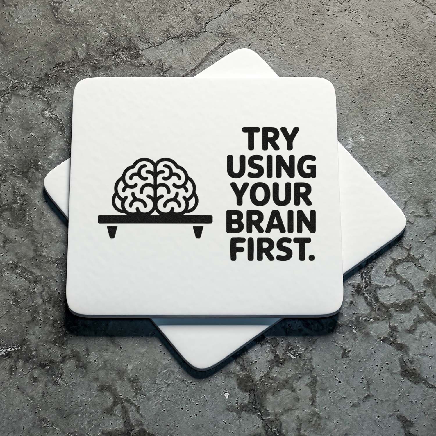Custom rubber stamp with brain icon and Try Using Your Brain First text for office humor and motivational messaging.