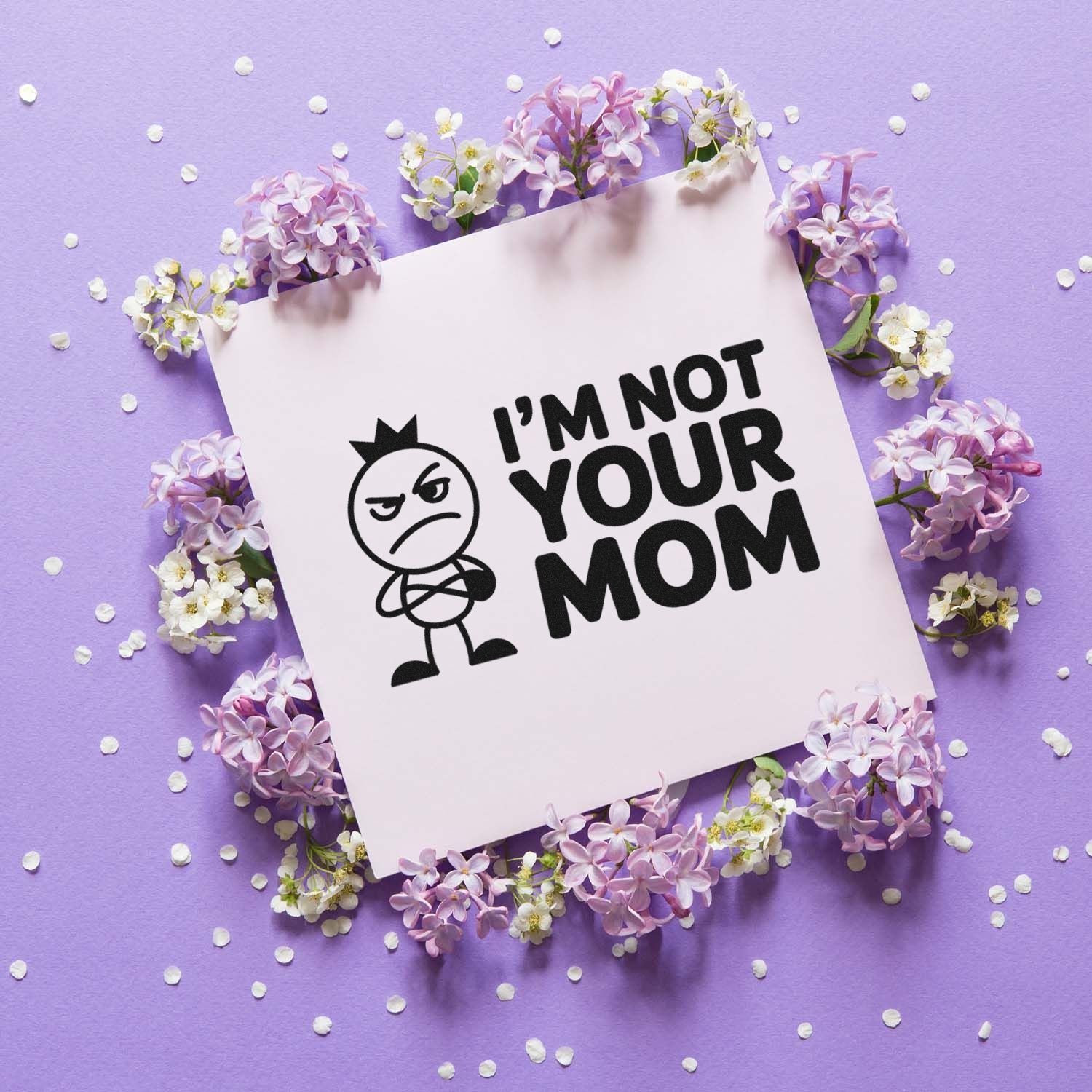 Funny rubber stamp design reading Im Not Your Mom with angry cartoon figure, on a pastel floral background.