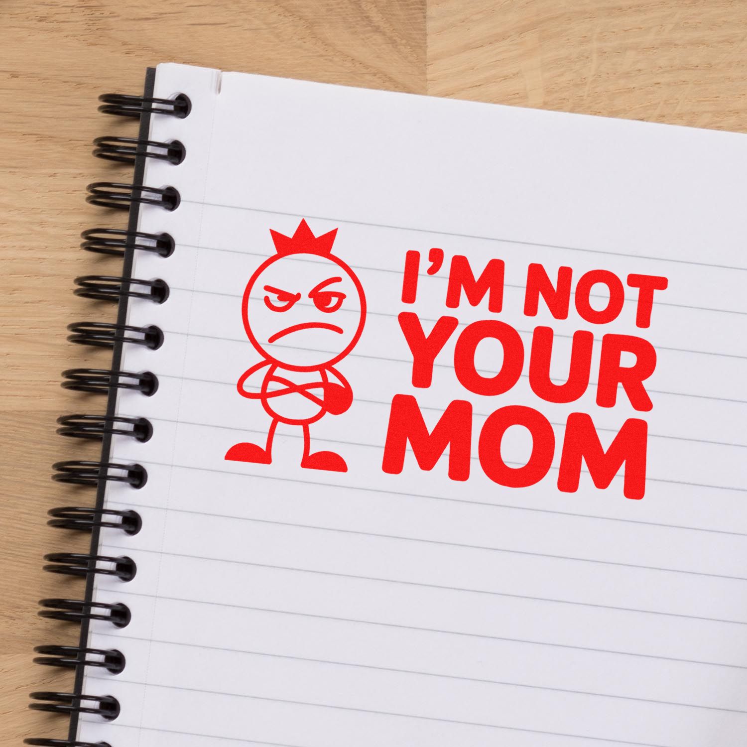 Red rubber stamp design saying Im Not Your Mom with angry cartoon figure on a notebook page for custom stamping.