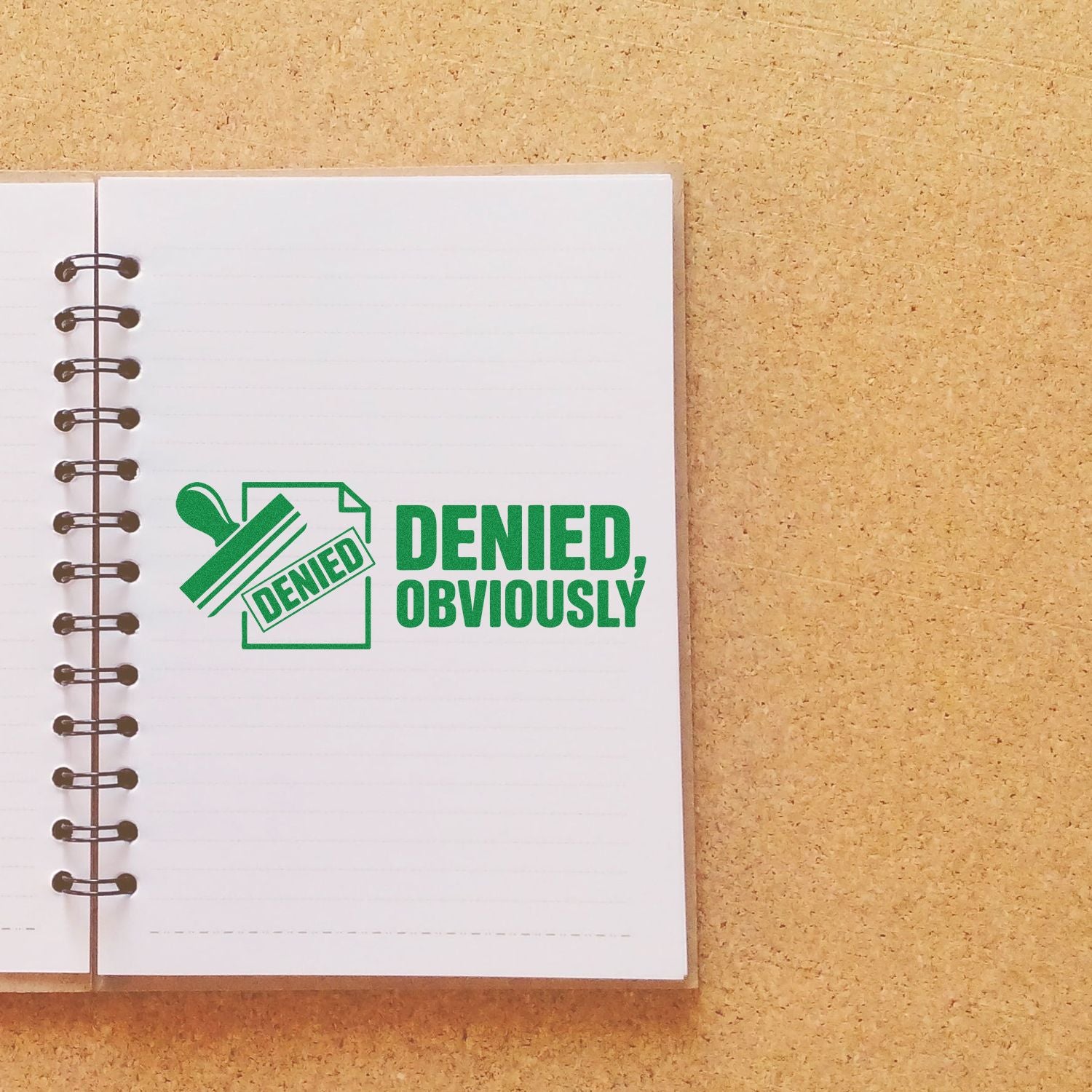 Green Denied, Obviously rubber stamp impression on notebook page, ideal for office rejection and approval marking.