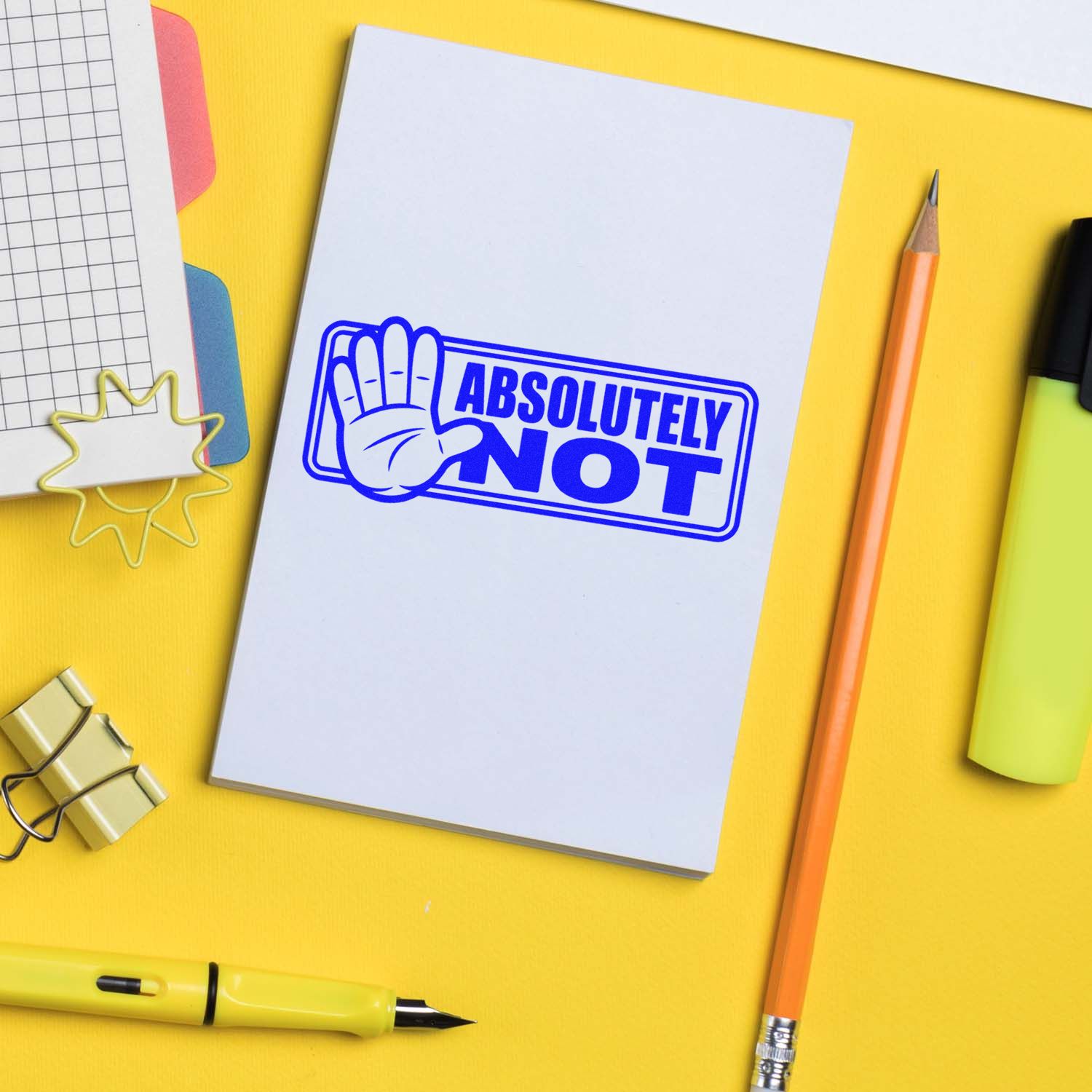 Custom rubber stamp design reading Absolutely Not with stop hand icon on notebook, ideal for office or teacher use.
