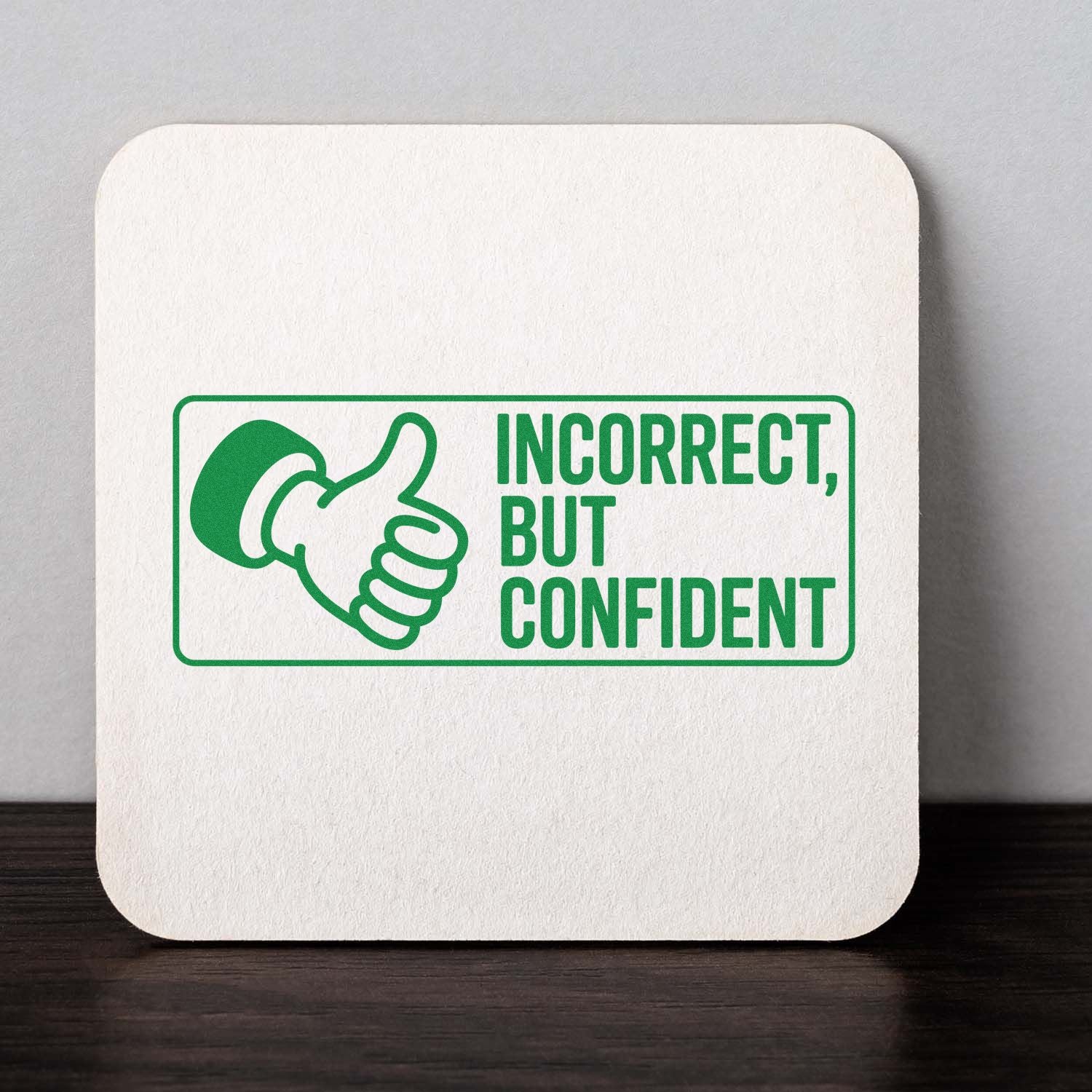 Green rubber stamp design with thumbs-up icon and text Incorrect, But Confident for humorous office approval or feedback.