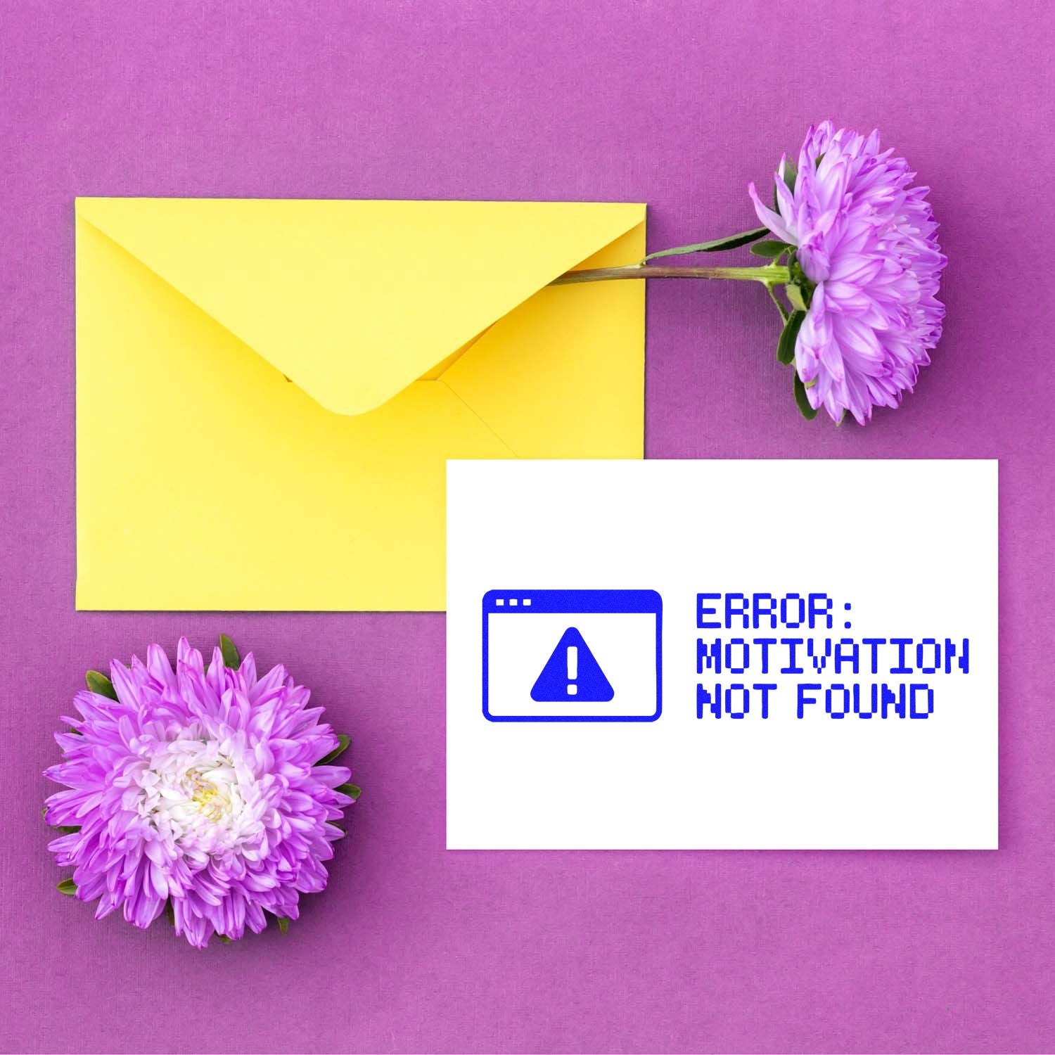 Motivation Not Found rubber stamp design on white card with error icon, styled with yellow envelope and purple flowers.