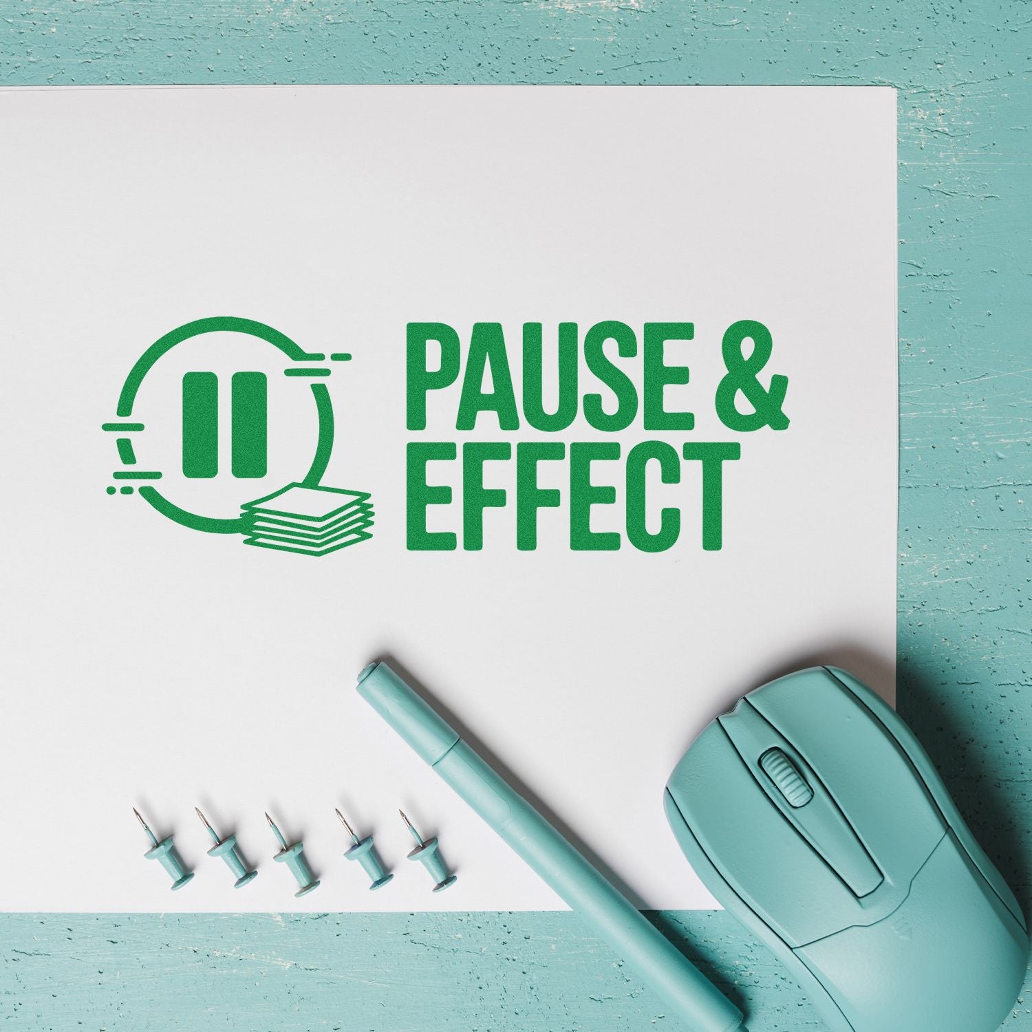 Custom rubber stamp design reading Pause & Effect with teal stationery for branding, packaging, and craft projects.