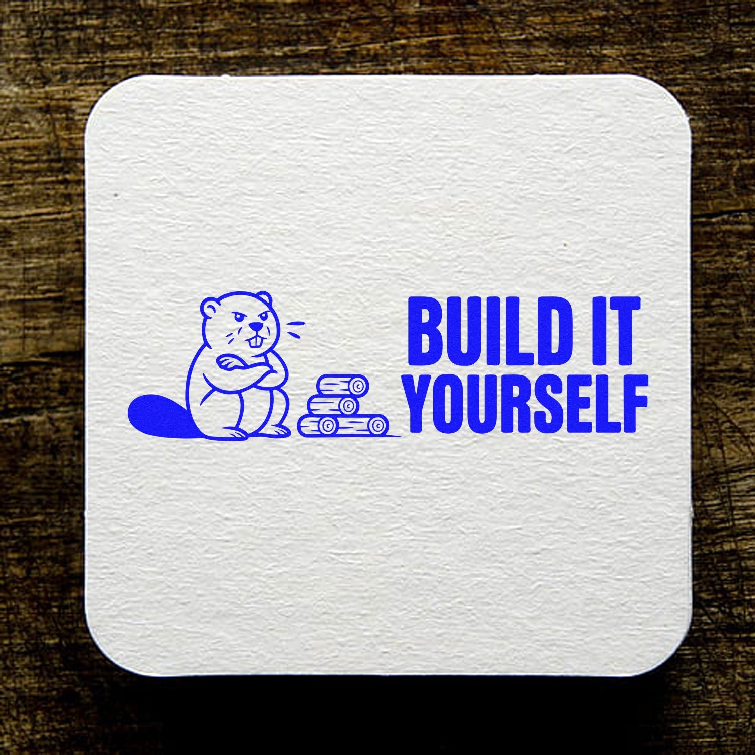Custom rubber stamp design with beaver graphic and Build It Yourself slogan for DIY woodworking projects.