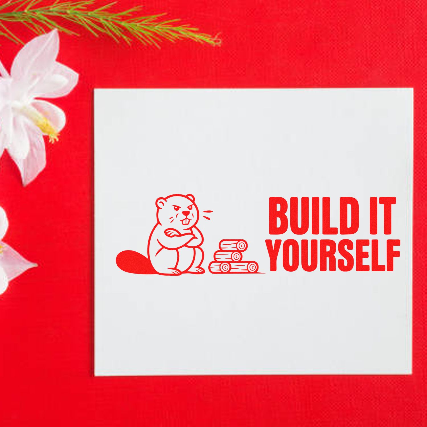 Build It Yourself beaver rubber stamp design for DIY crafts, shown on a red card background