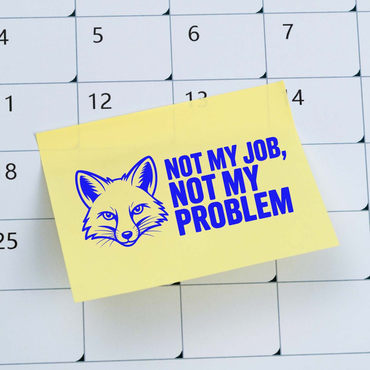 Fox rubber stamp with Not My Job, Not My Problem on a sticky note over a calendar.