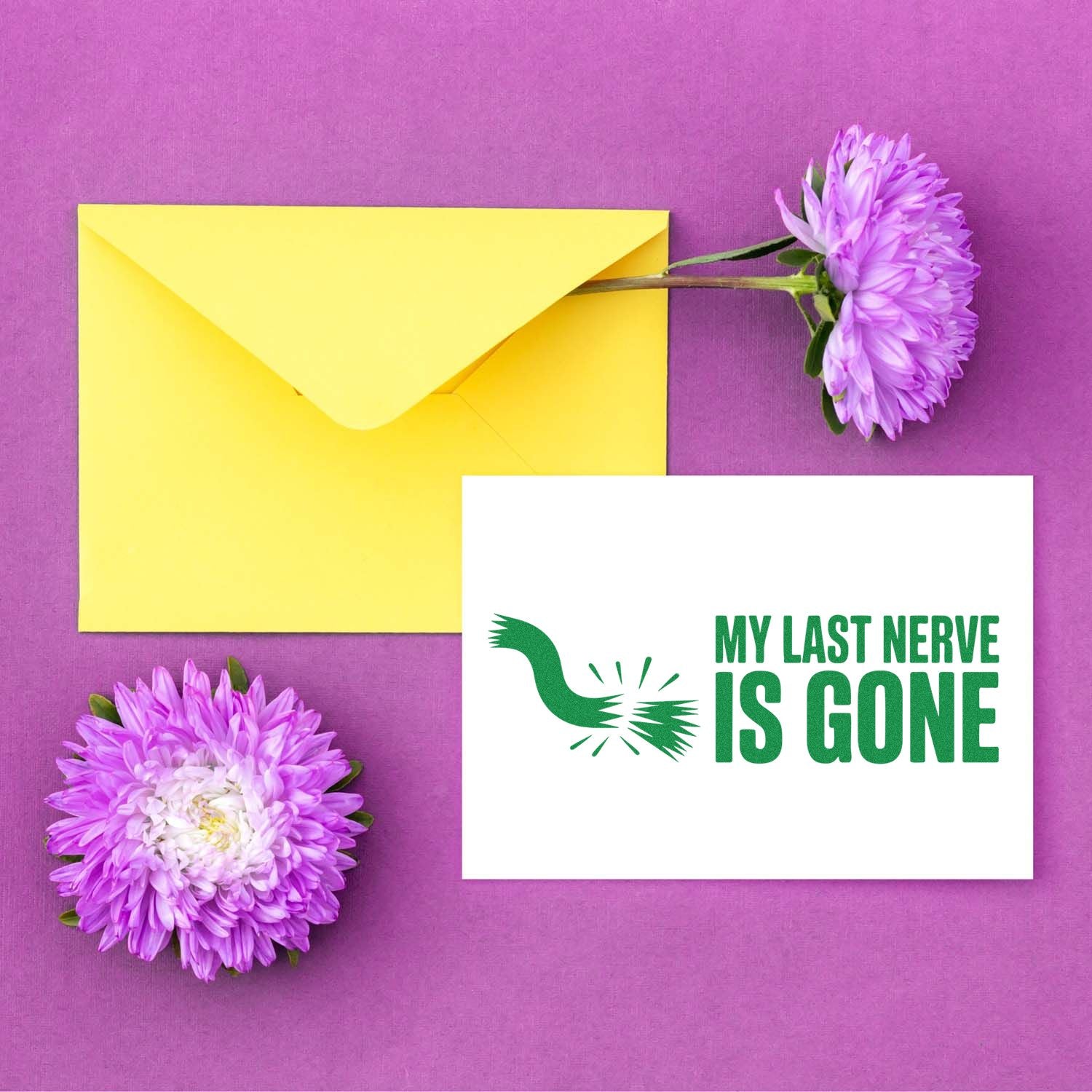 Custom rubber stamp with My Last Nerve Is Gone sentiment, styled with a yellow envelope and purple flowers on a purple background.