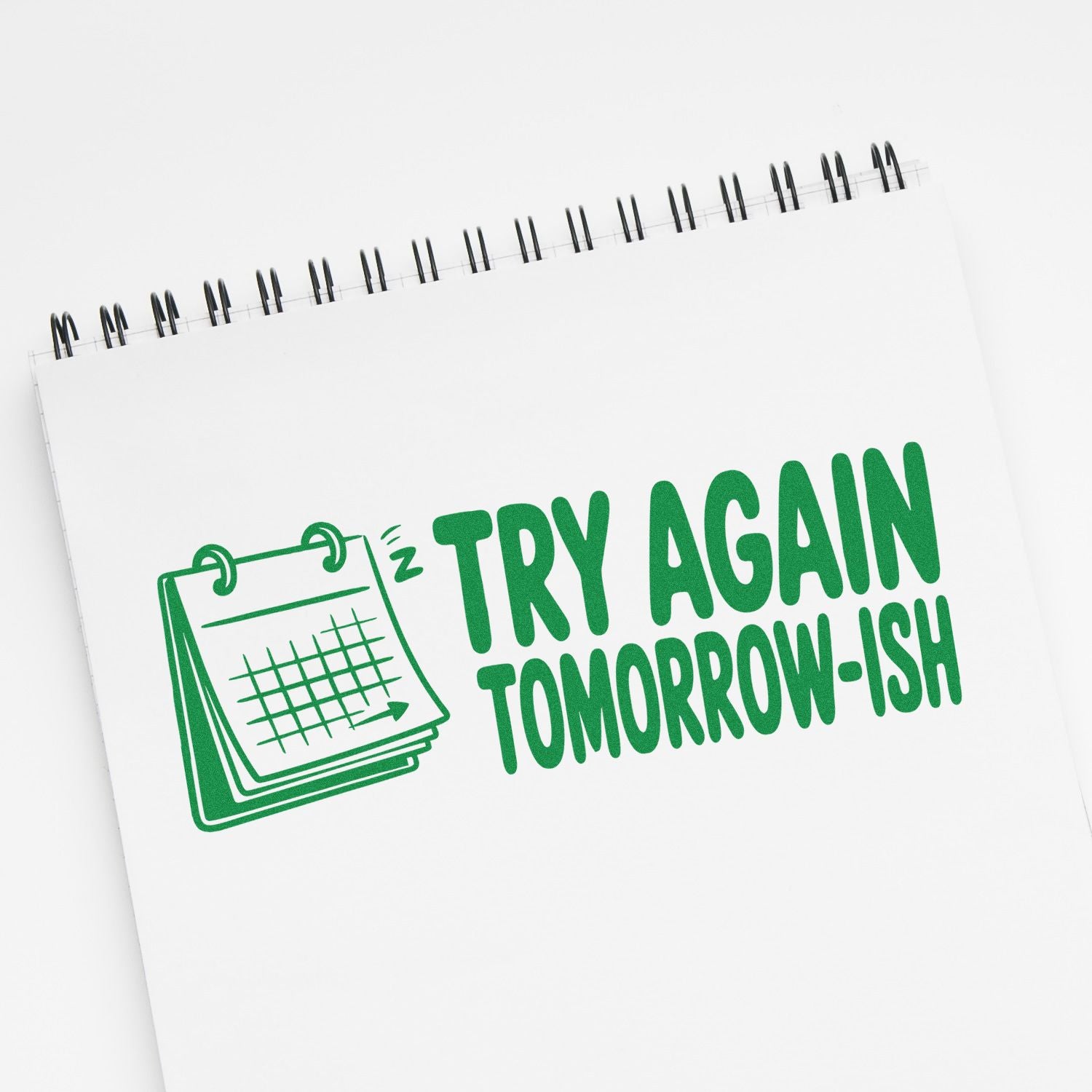 Funny rubber stamp design with calendar icon and text Try Again Tomorrow-ish for office planners and reminders.