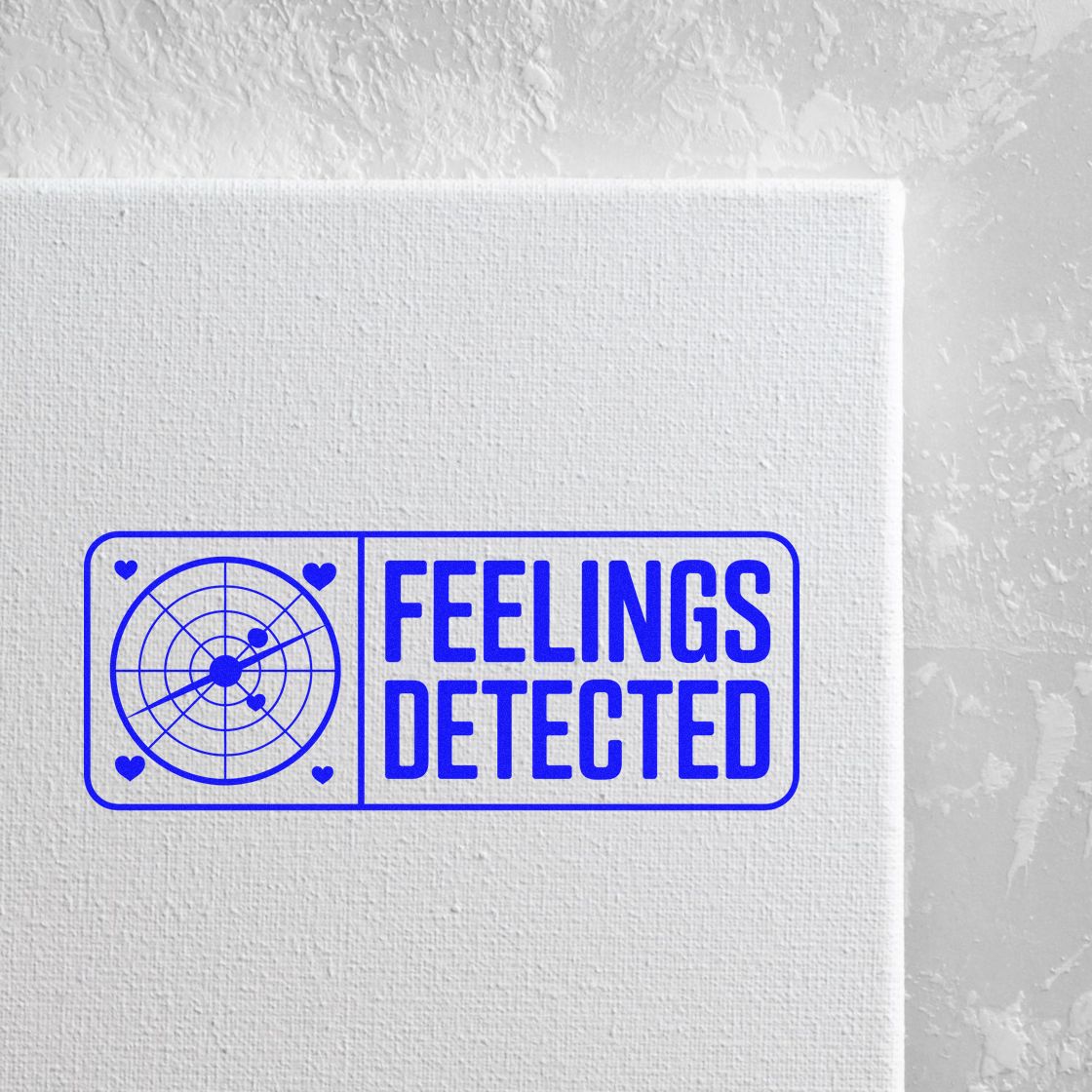 Quirky Feelings Detected rubber stamp design with radar and hearts for cards, packaging, and craft projects.