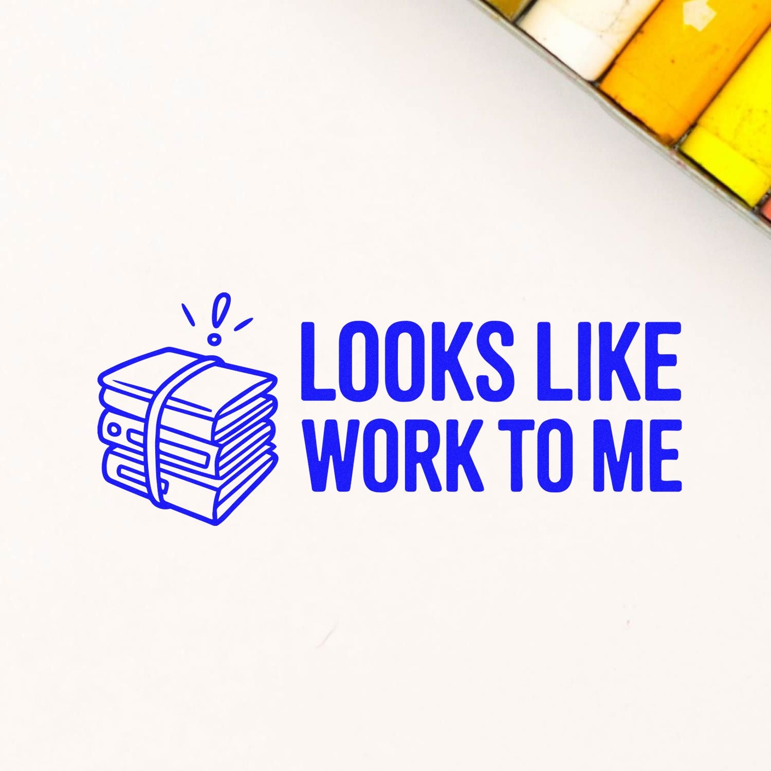 Rubber stamp design with Looks Like Work to Me text and paper stack icon for office humor and craft branding.
