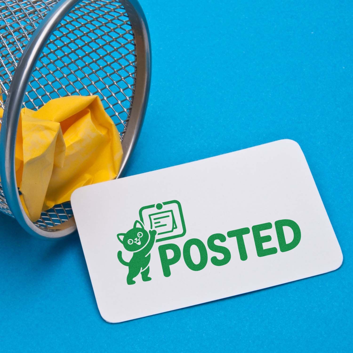 Custom rubber stamp with green POSTED cat mail icon, ideal for marking outgoing mail and office stationery.