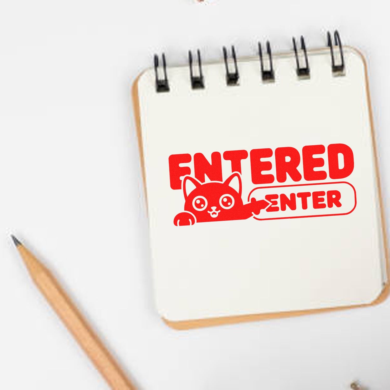 Custom Entered rubber stamp design with cat pointing to ENTER button for office and classroom marking.