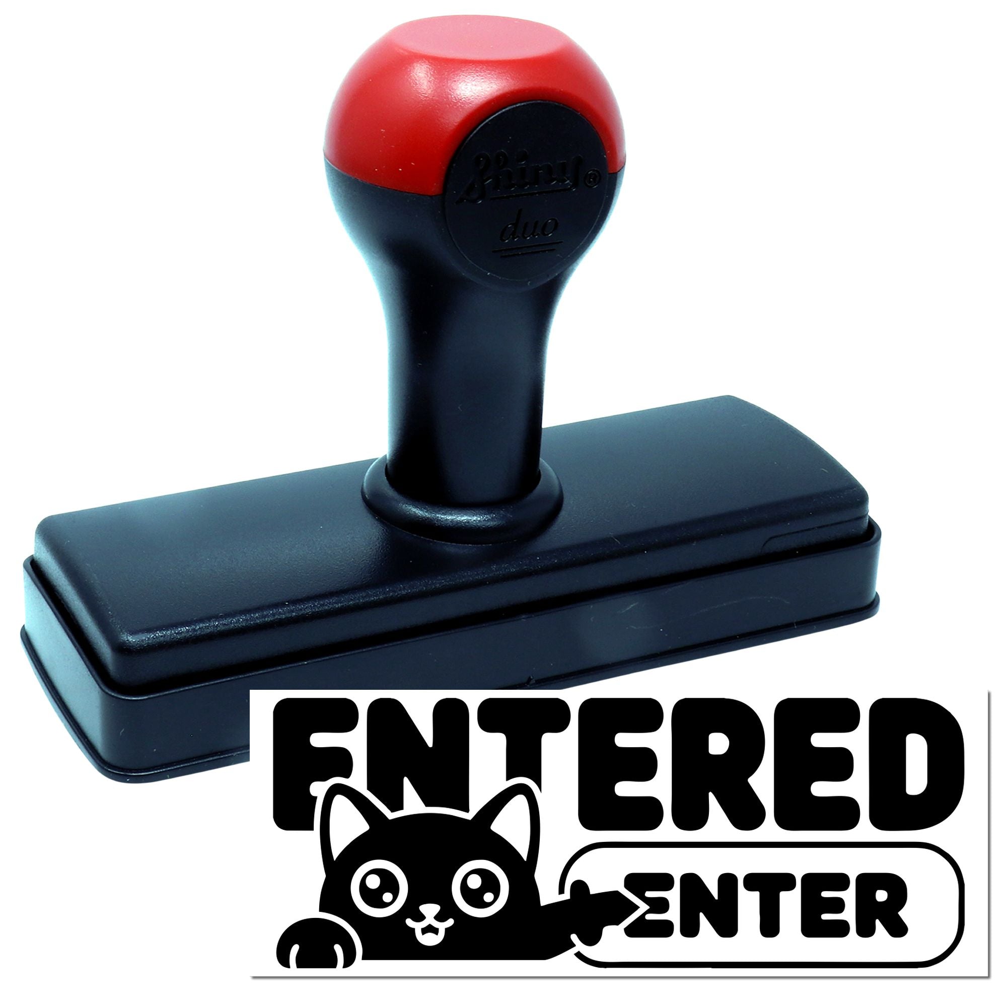 Self-inking rubber stamp with ENTERED cat design for document marking and office approval.