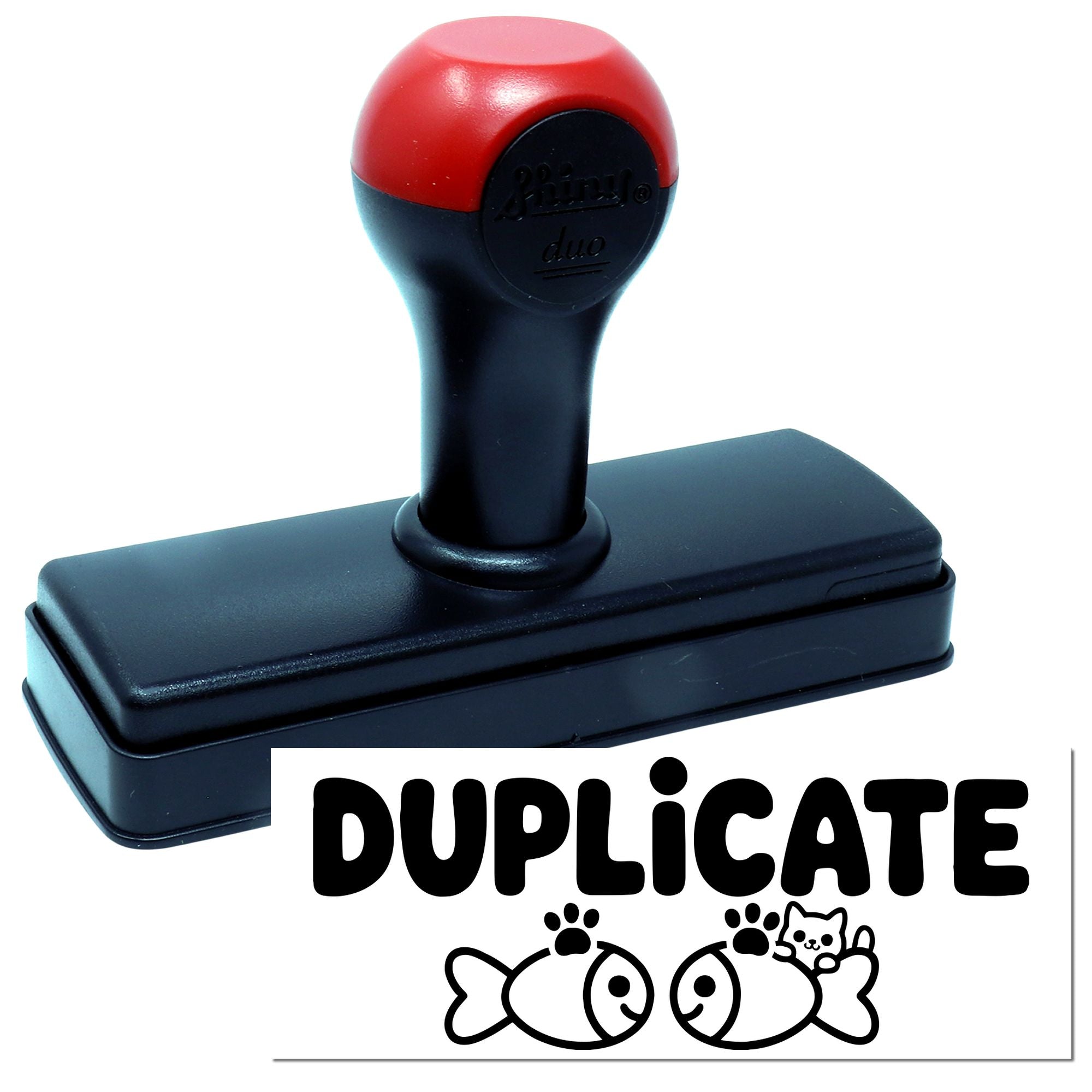 Duplicate self-inking rubber stamp with cat-fish design for marking copies and office paperwork.
