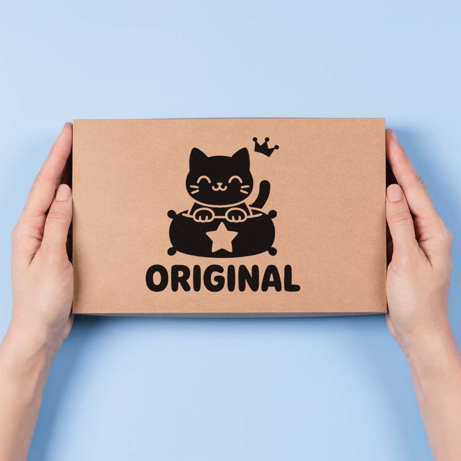 Custom rubber stamp logo on kraft gift box with cat design and ORIGINAL text, shown in hands for packaging branding.