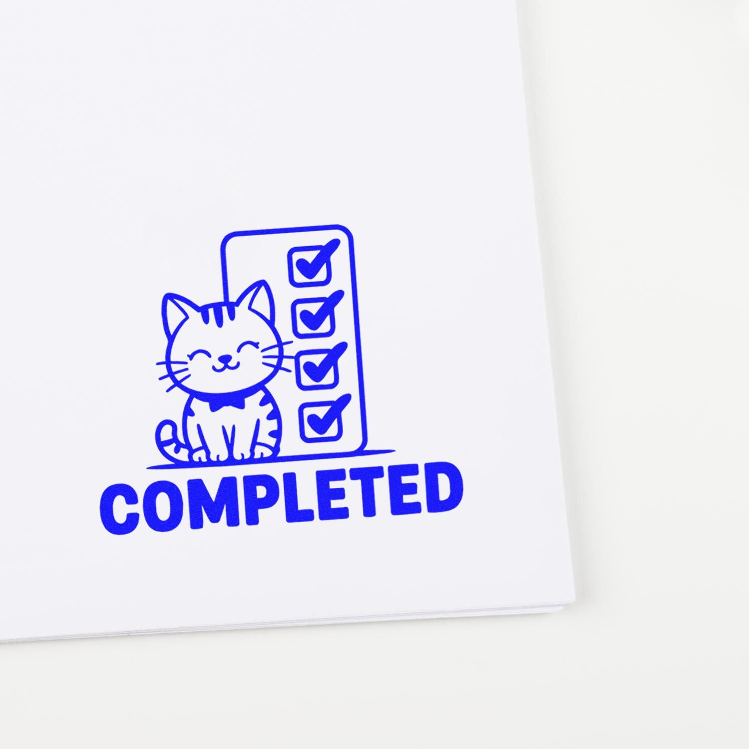 Completed cat checklist rubber stamp for marking finished tasks in planners, notebooks, and office paperwork.