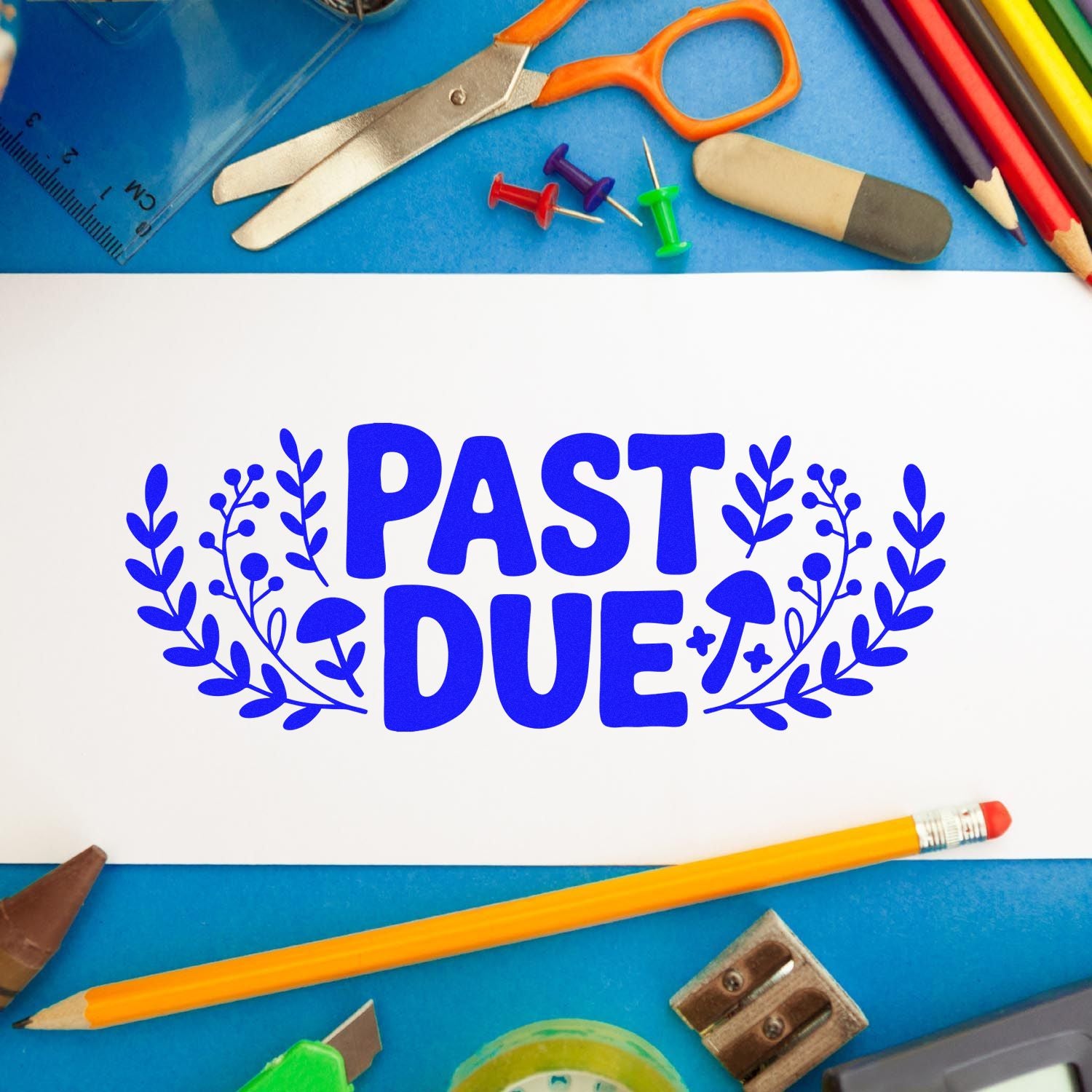 Past Due rubber stamp design for teachers and offices, shown with school supplies on paper.