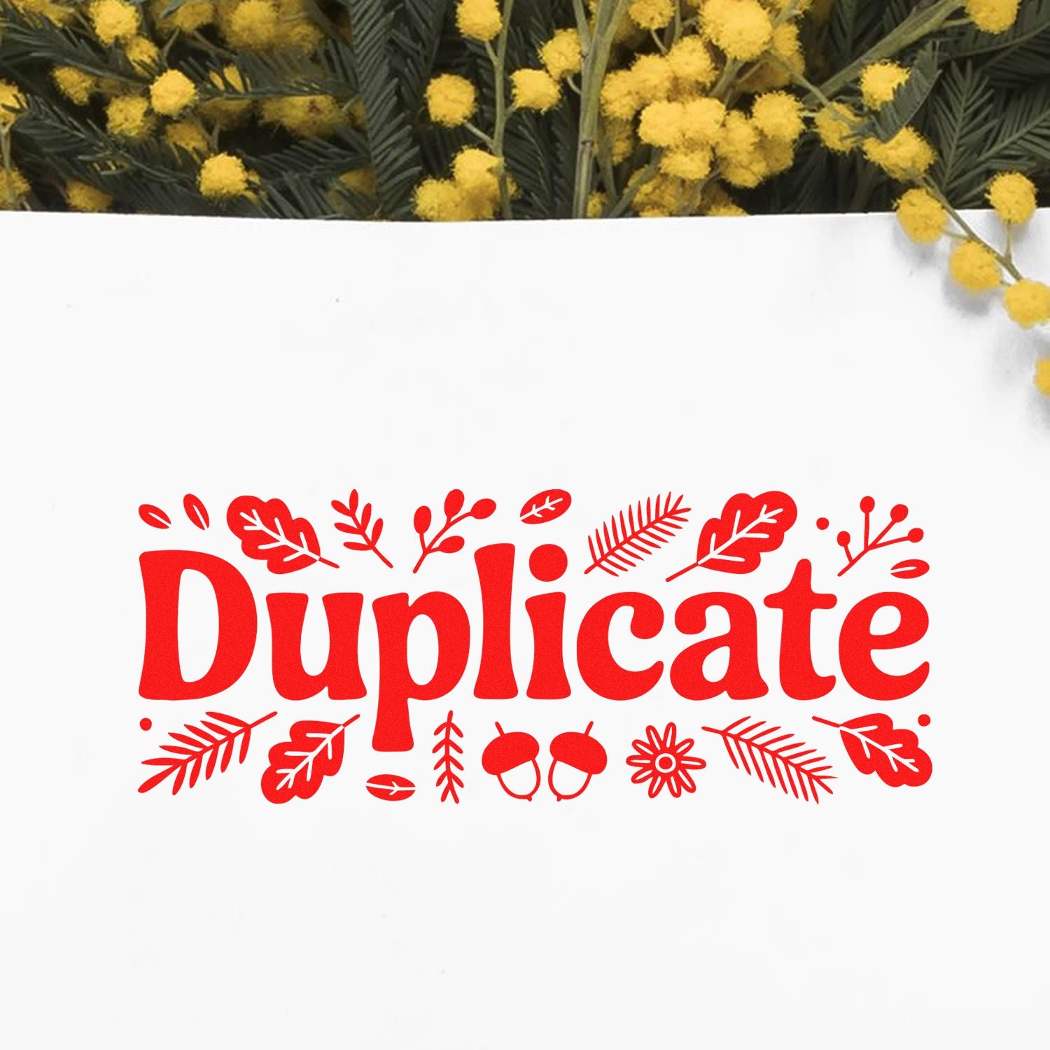 Red Duplicate rubber stamp design with floral accents for marking document copies and office paperwork.