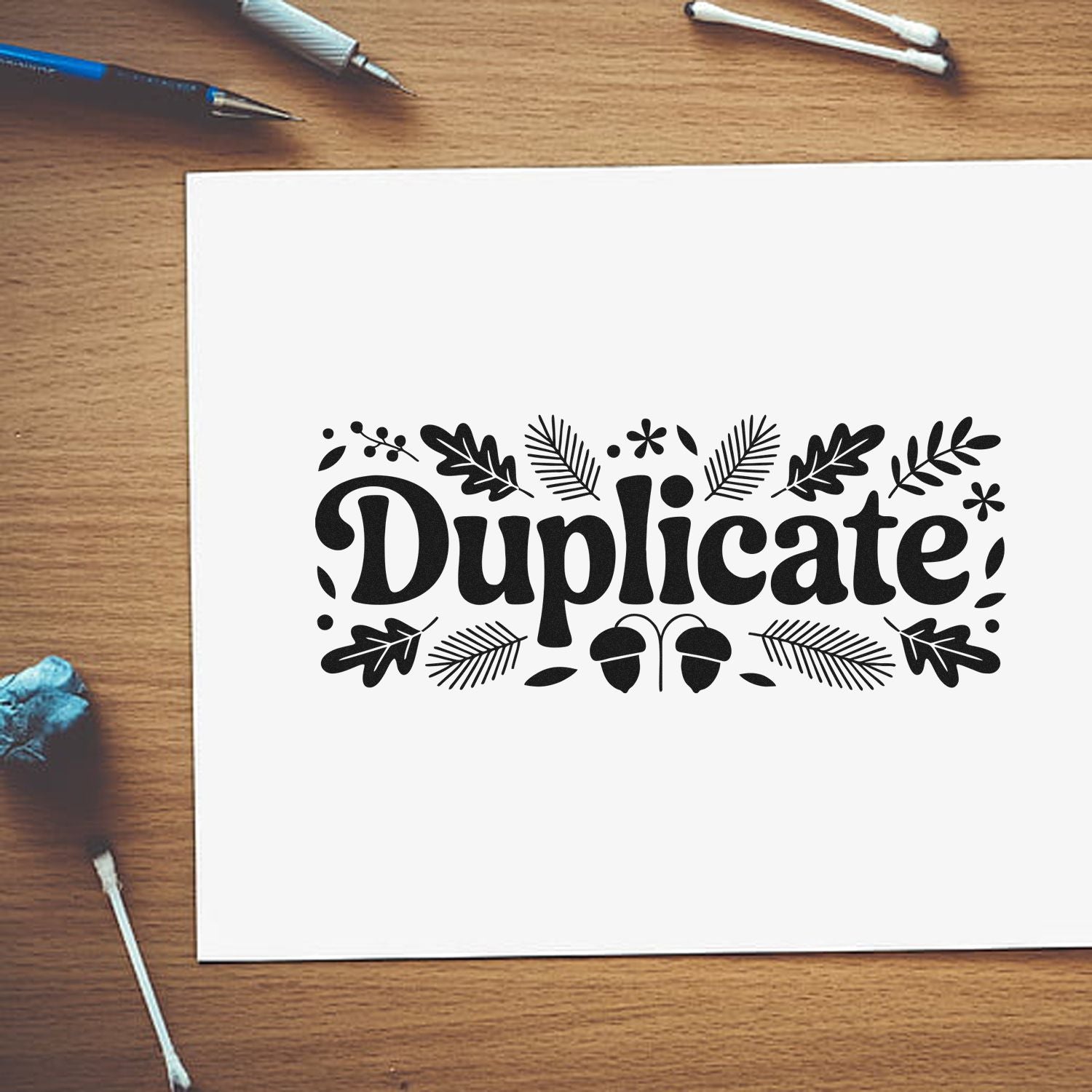 Decorative Duplicate rubber stamp design with botanical leaves on paper for office copying and labeling.
