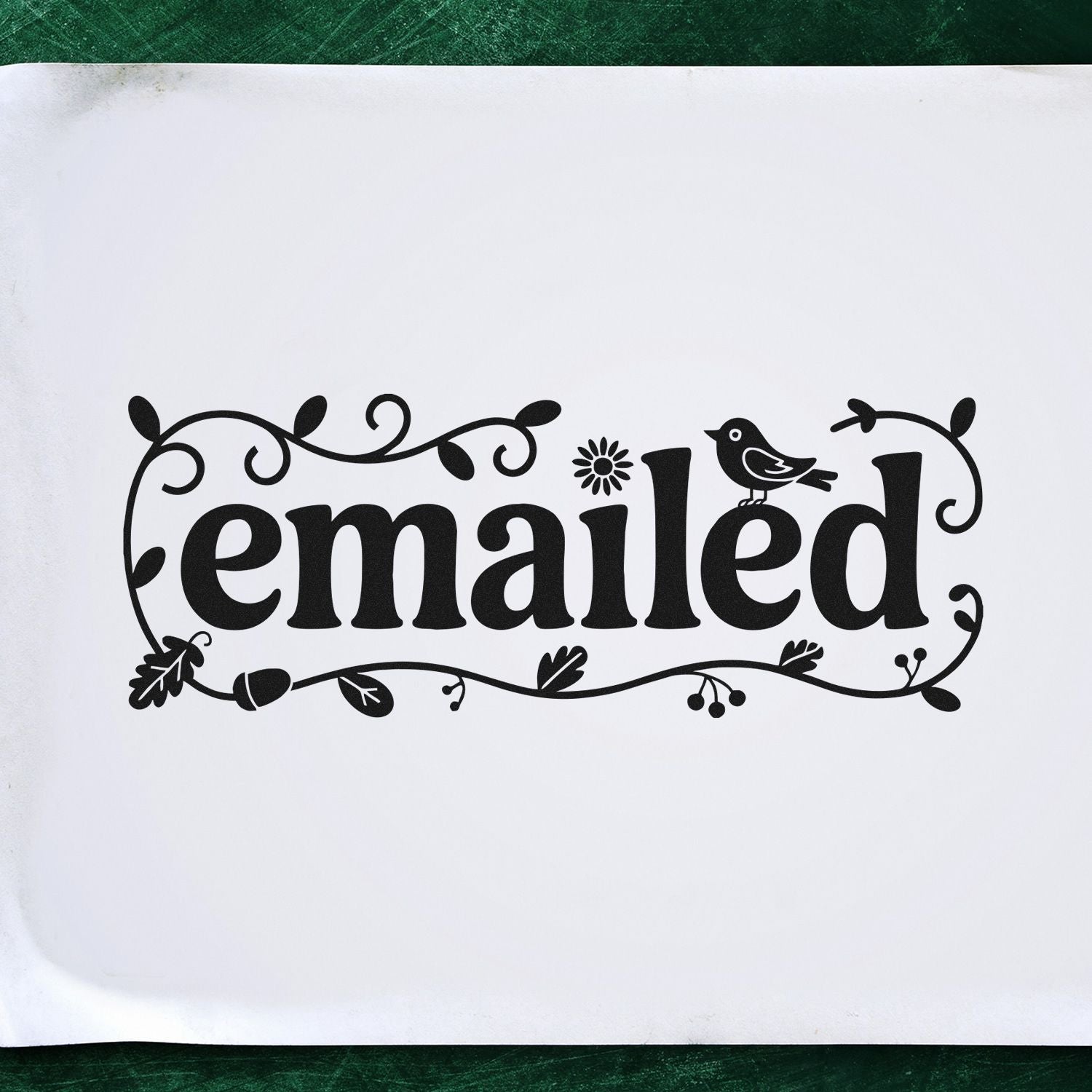 Decorative "emailed" rubber stamp with floral border and bird for scrapbooking, stationery, and mail-themed crafts.