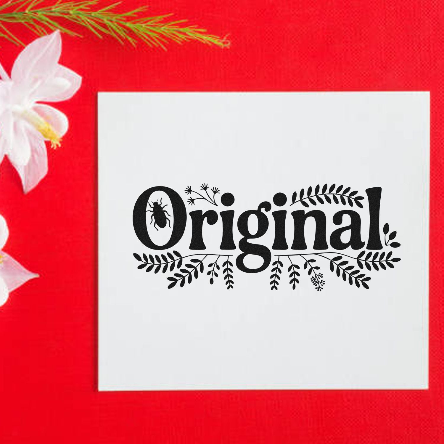 Original decorative rubber stamp design with beetle and leafy floral accents, shown on a white card with red background.