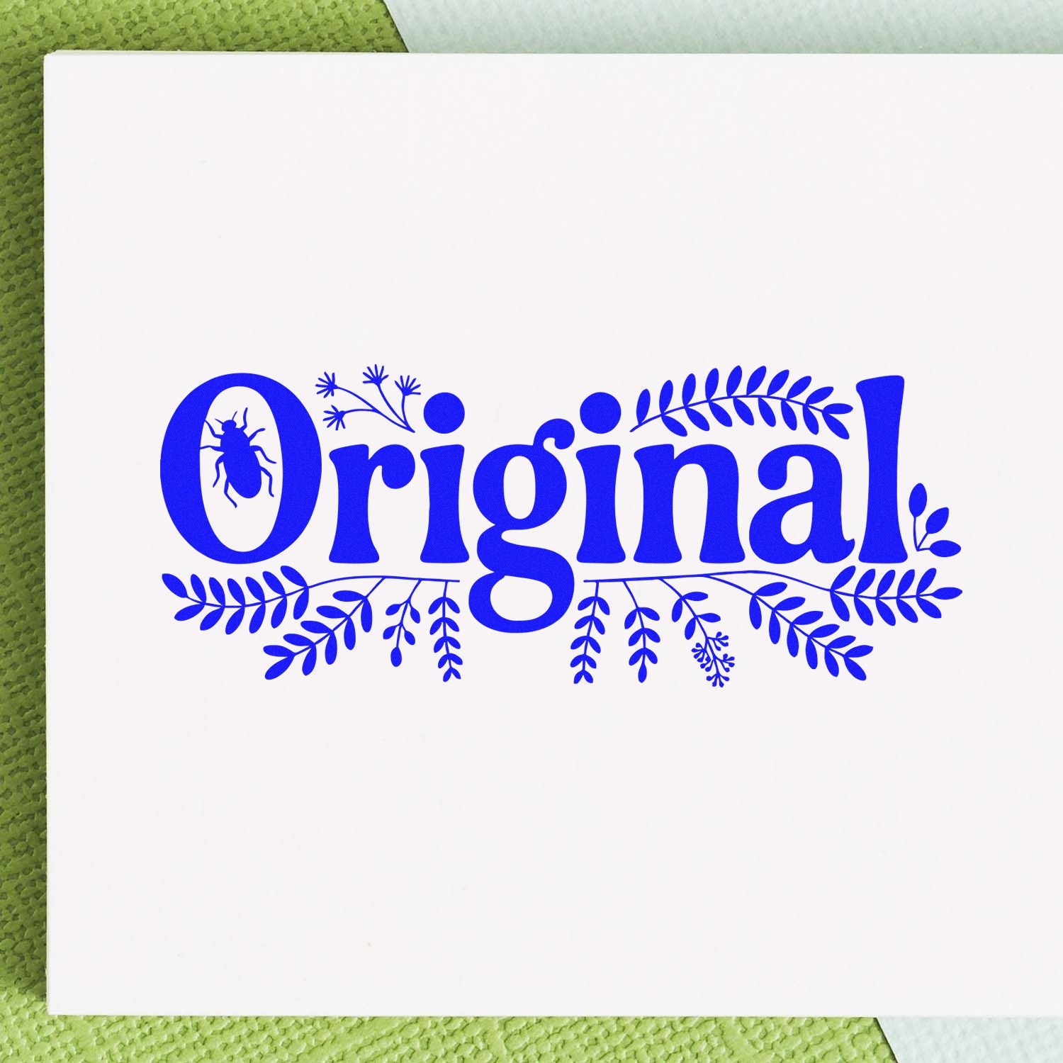Decorative Original rubber stamp design with floral leaves and insect detail for handmade packaging.