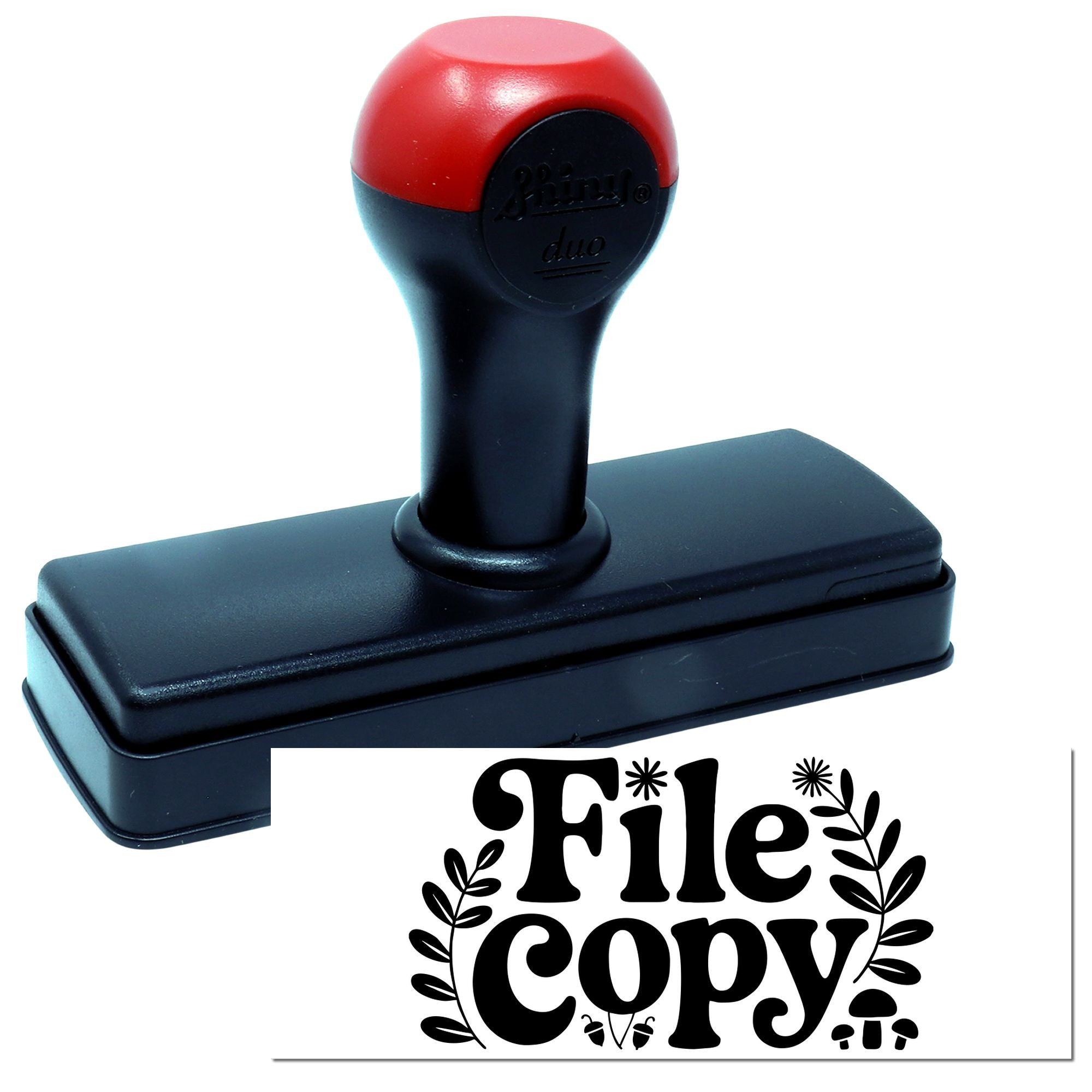 Self-inking rubber stamp with File Copy imprint for office document filing and records.