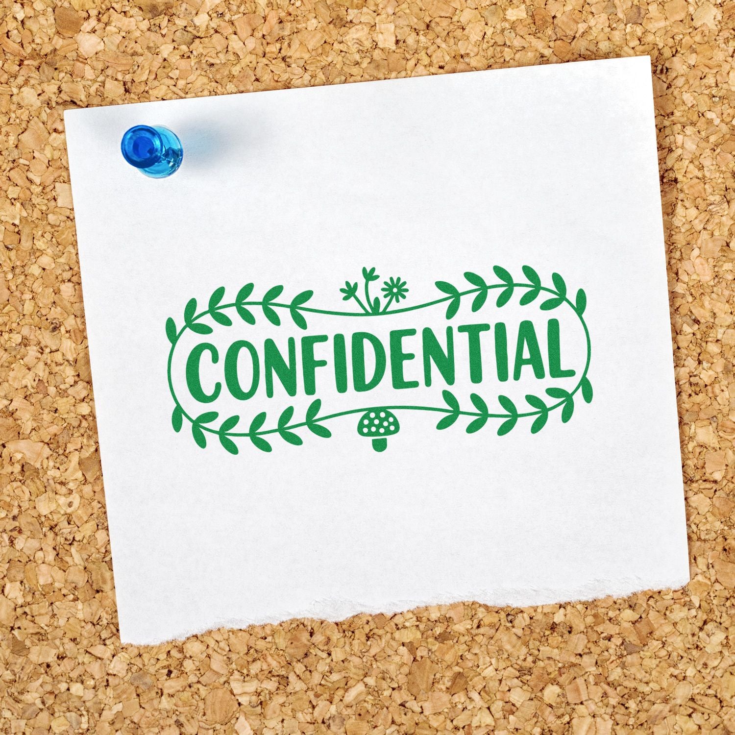 Confidential rubber stamp design on pinned paper, with decorative leaves and mushroom for secure document labeling.