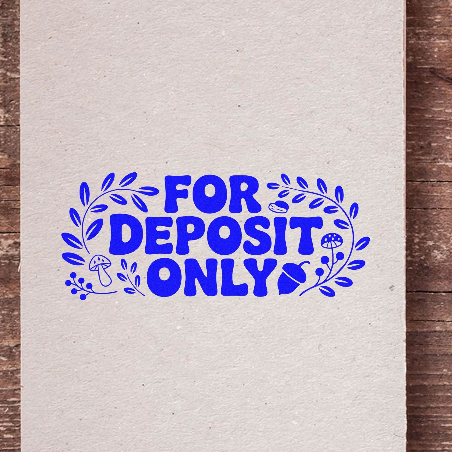 Decorative FOR DEPOSIT ONLY rubber stamp with leafy border, ideal for business bank deposit endorsements.