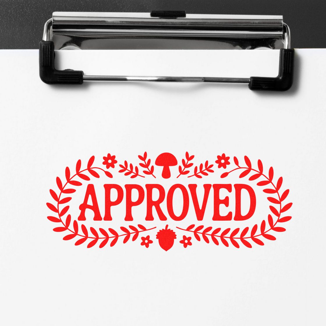 Approved rubber stamp design on clipboard with red decorative approval mark for office and document use.
