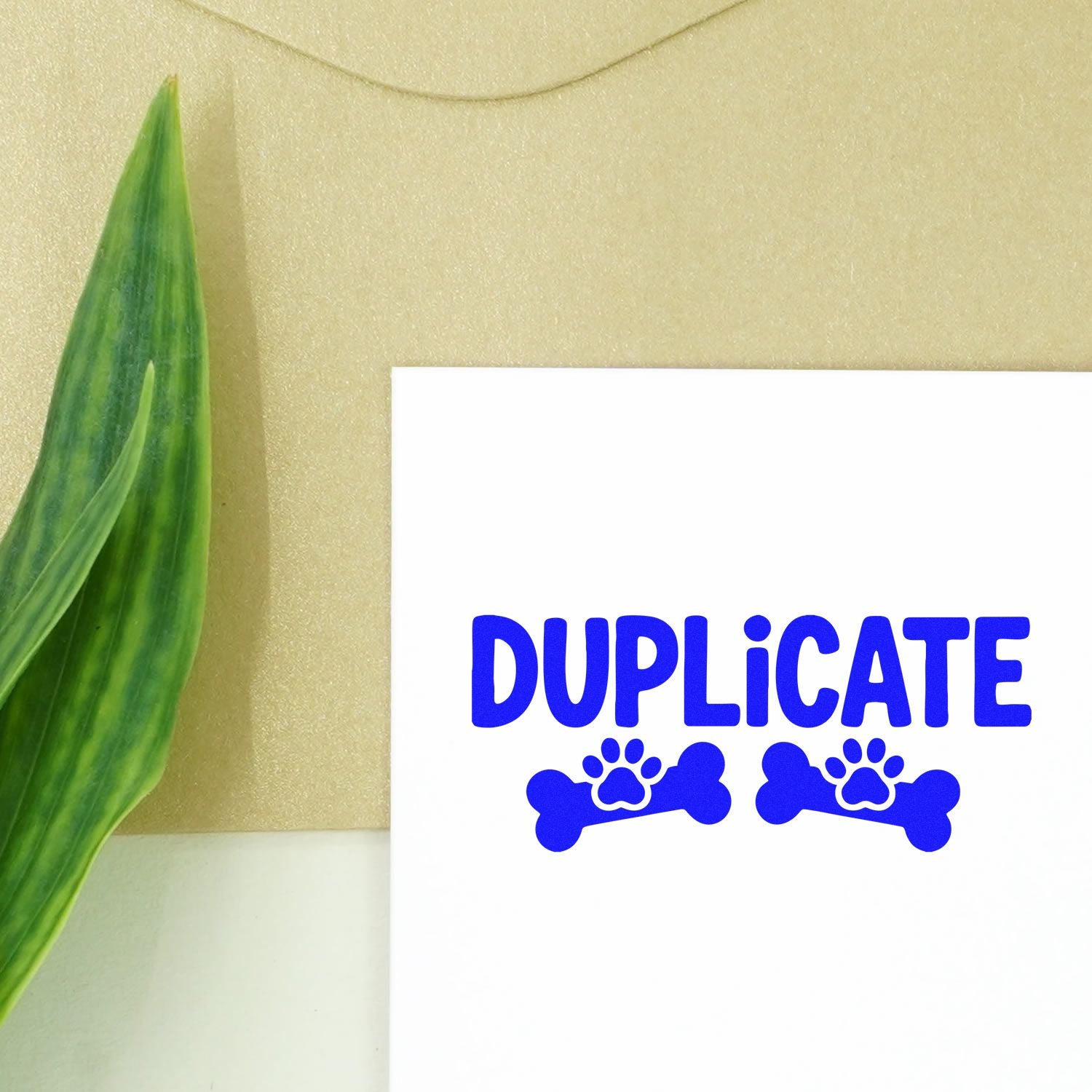 Blue duplicate rubber stamp with paw print and bone design for pet records, vet clinics, and office paperwork.