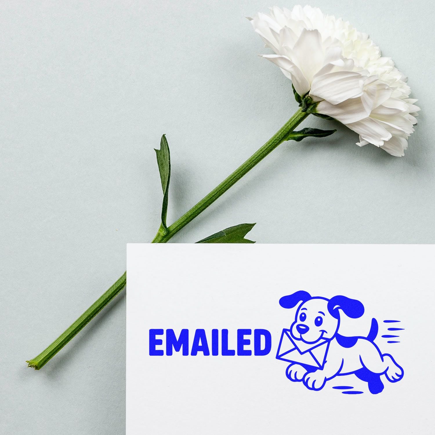 Blue Emailed rubber stamp with running dog and envelope, ideal for marking completed office correspondence.