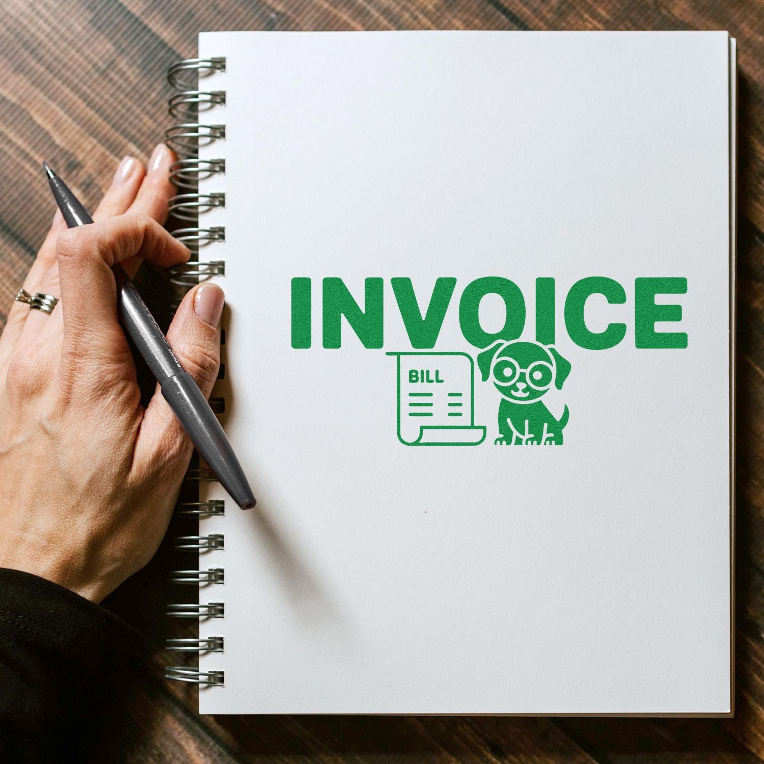 Invoice rubber stamp design on notebook with bill icon and dog illustration, ideal for accounting and pet business paperwork.