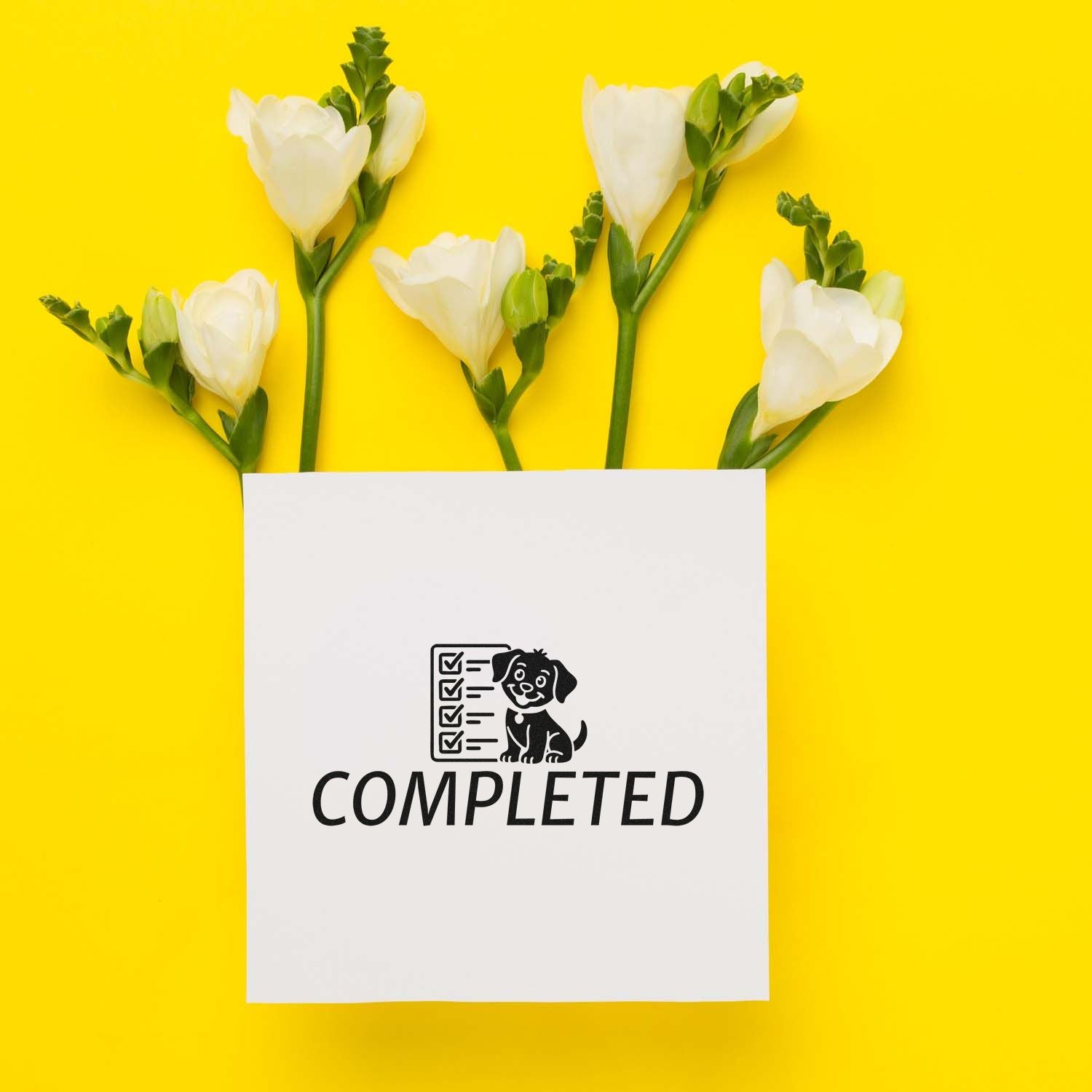 Completed rubber stamp with dog checklist icon on card, styled with white flowers on a bright yellow background.